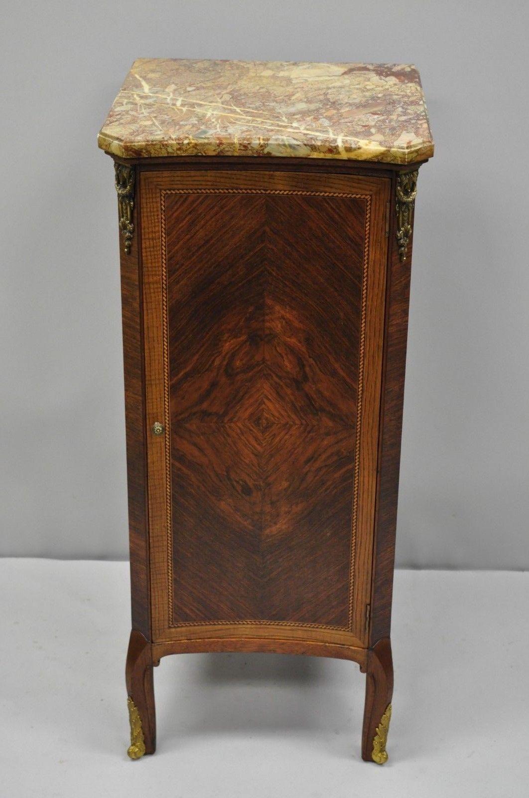 Antique French Louis XV style marble-top chest of drawers. Item features cast bronze ormolu, satinwood inlay, shaped marble top, beautiful walnut and rosewood construction, 5 dovetailed drawers and cabriole legs. circa early 20th century.