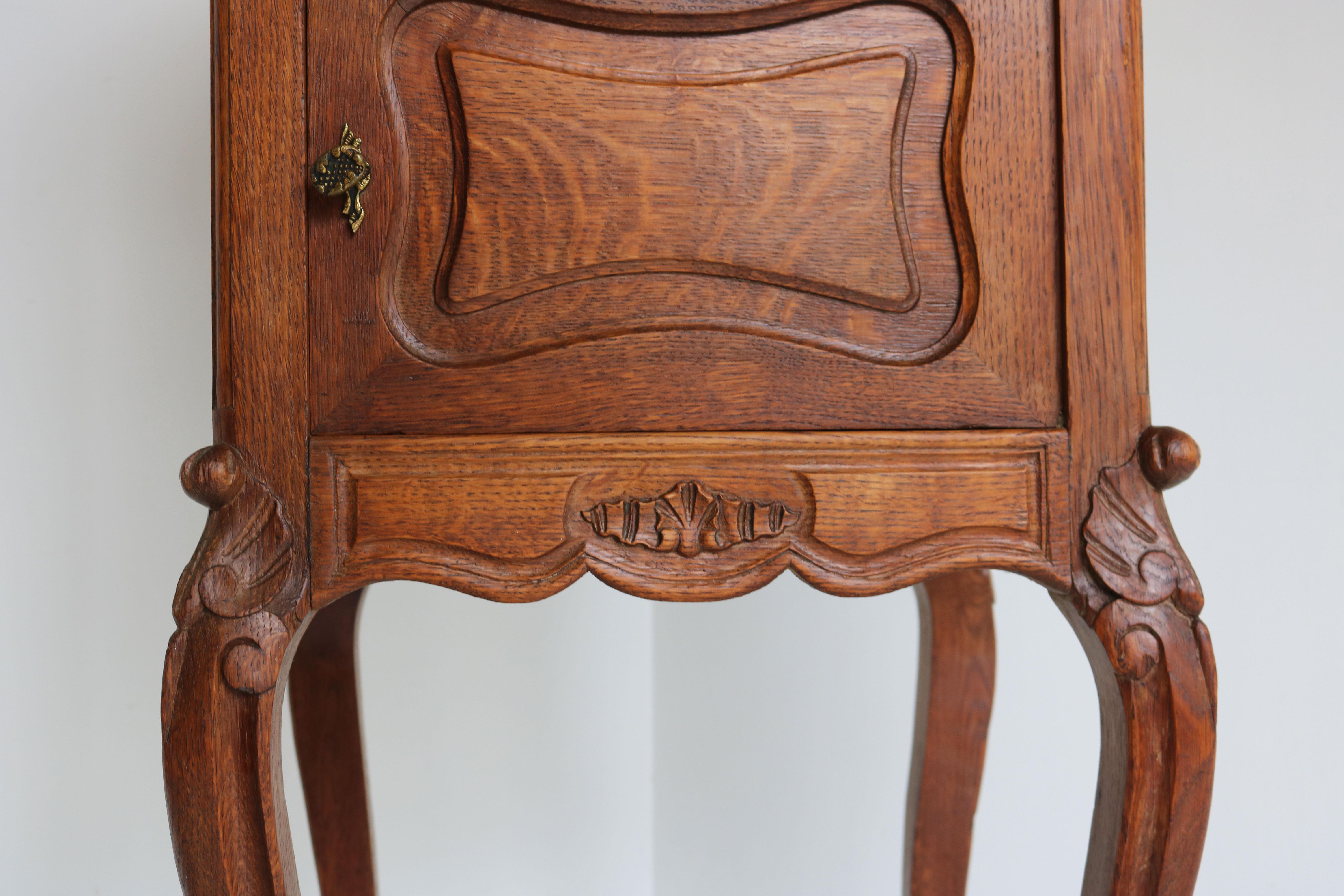 Gorgeous antique French Louis XV nightstand 19th century. 
Nice quality solid oak hand-carved amazing craftsmanship , finished on all sides so you are able to place it free standing. 
Lovely Italian Carrara marble top with nicely carved edges. The