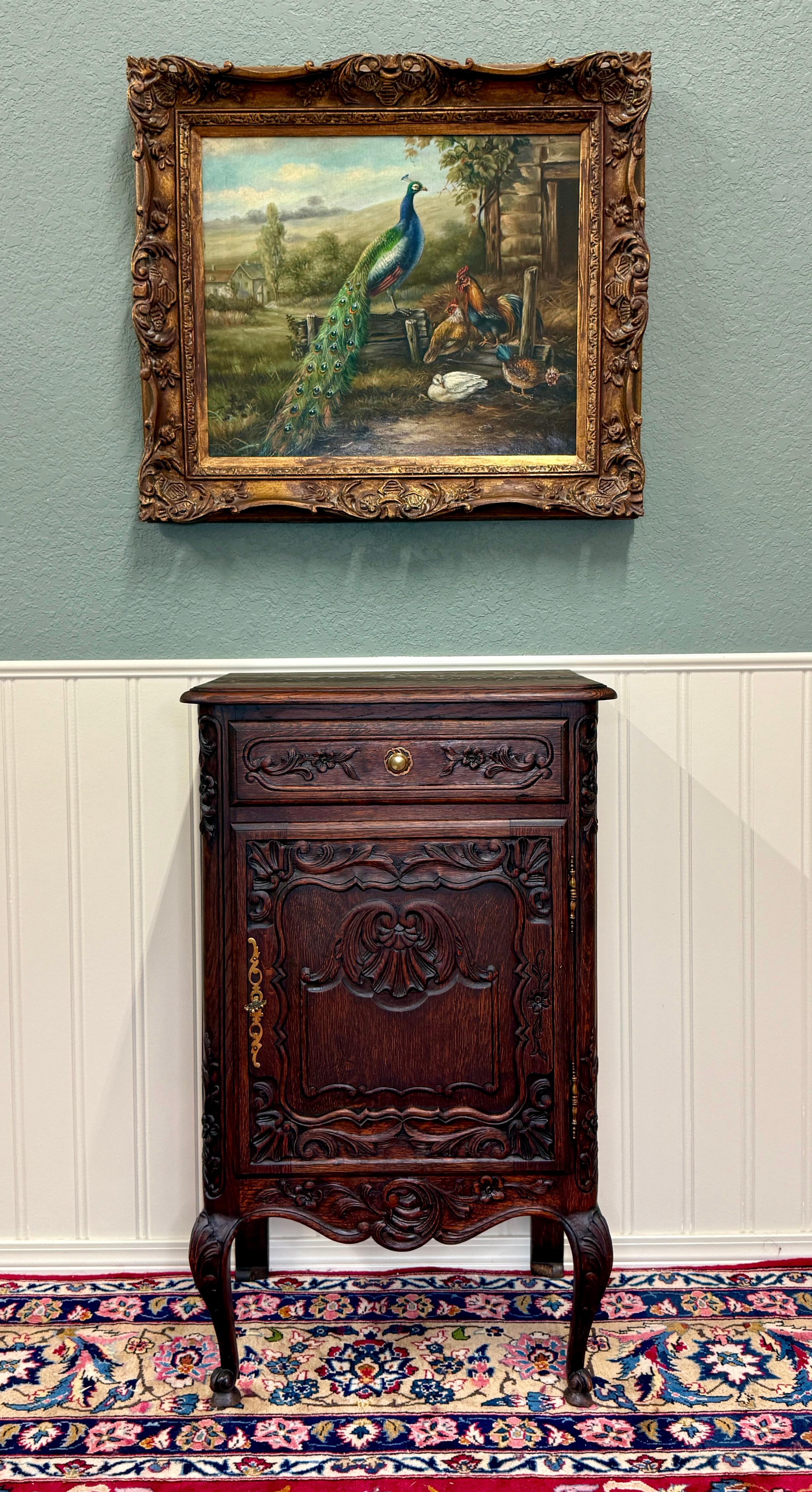     Beautifully Carved Antique French Tiger Oak Louis XV Style Nightstand Cabinet with Drawer 1 of 2~~c. 1920s

    Beautifully carved tiger oak nightstand or cabinet with raised panel sides, carved knees and hoof feet

    Perfect statement piece