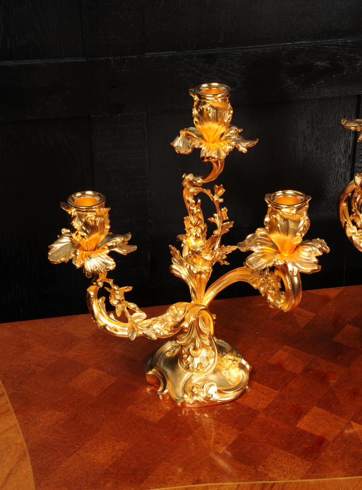 A magnificent pair of antique French candelabra in the manner of Juste Aurele Meissonier (Italian, 1695-1750). Beautifully formed as acanthus wrapped stems, with swirling acanthus arms and fluted tulip-form nozzles. The design is beautifully bold,