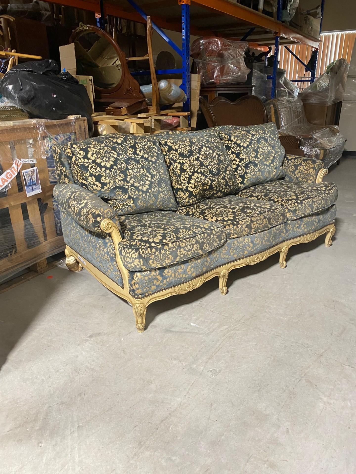 This Antique French Louis XV Painted Sofa Bed seamlessly blends elegance, flair, and comfort into a single piece. Showcasing the graceful, timeless lines of Louis XV style, it features exquisite cabriole leg forms that embrace the sideboards, an