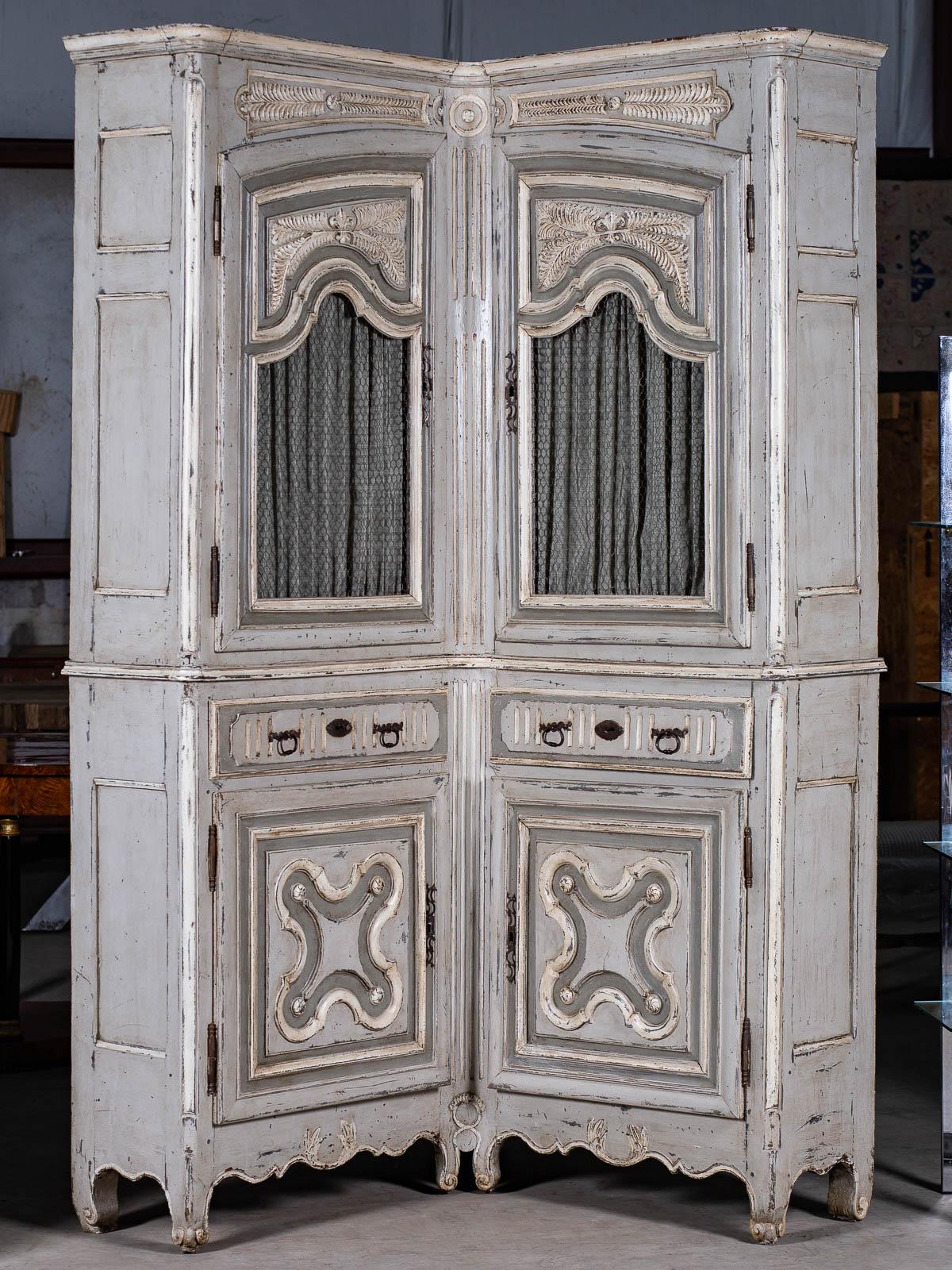 Receive our new selections direct from 1stdibs by email each week. Please click Follow Dealer below and see them first!

A rare and unusual antique French Louis XV period painted corner cabinet or buffet à deux corps, circa 1740. The base of the