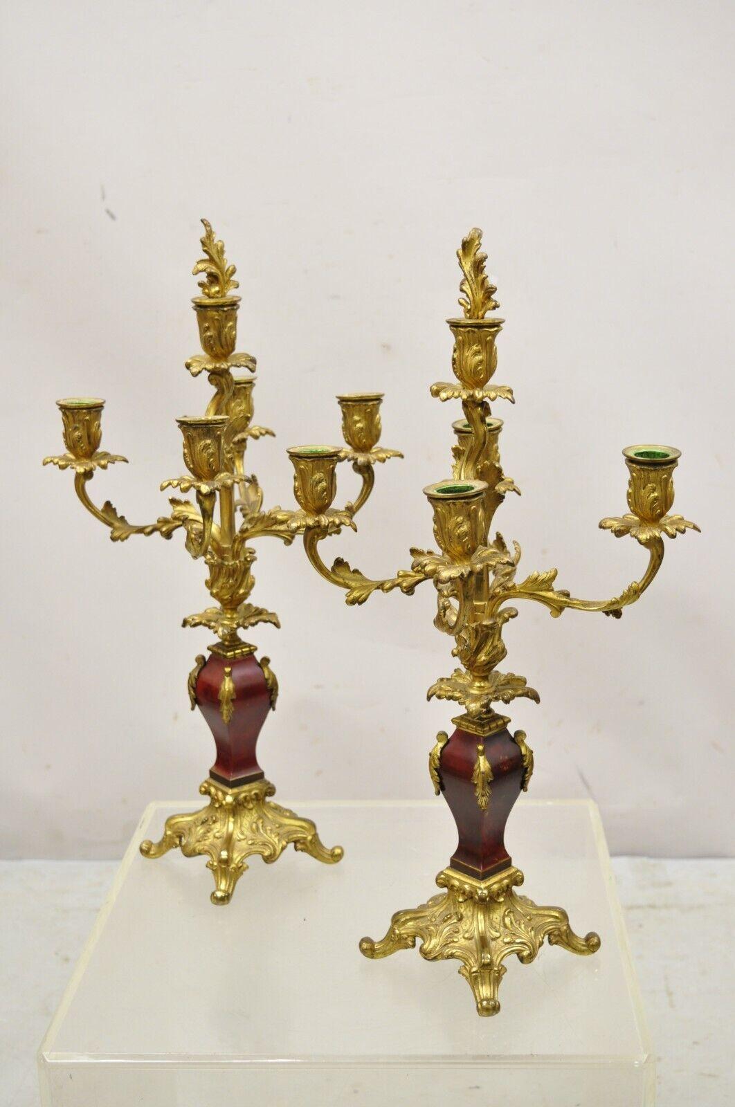 Antique French Louis XV Rococo style gold gilt bronze candelabras - a pair. Item featured includes removable flower finial snuffers, red painted faux marble shafts, very nice antique pair, quality French craftsmanship. circa 1900. Measurements: