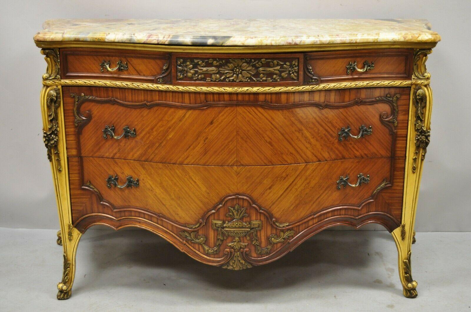 Antique French Louis XV rogue marble top satinwood commode dresser. Item features a French rogue marble shaped top, serpentine front, beautiful wood grain, nicely carved details, 3 dovetailed drawers, cabriole legs, very nice antique item, quality