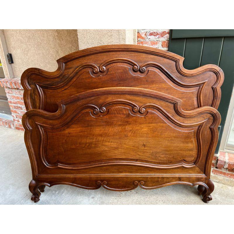 Antique French Louis XV Style Bed Carved Walnut Parisian European Size w Rails.

Direct from France, this antique French bed, with headboard, footboard AND original rails!
The headboard and footboard are identical, with a stunning serpentine form,