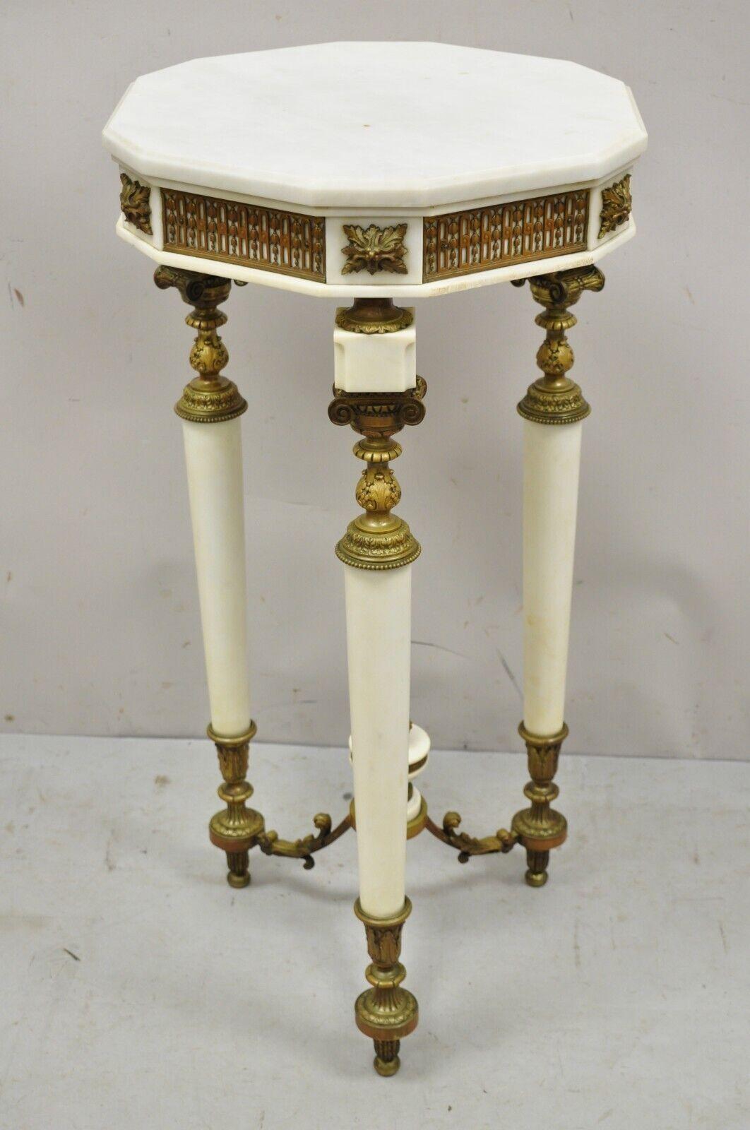 Antique French Louis XV Style Bronze and Marble Parlor Accent side table. Item features marble column form legs, remarkable bronze detailed ormolu, very nice antique item, great style and form. Circa 19th Century. Measurements: 33.5