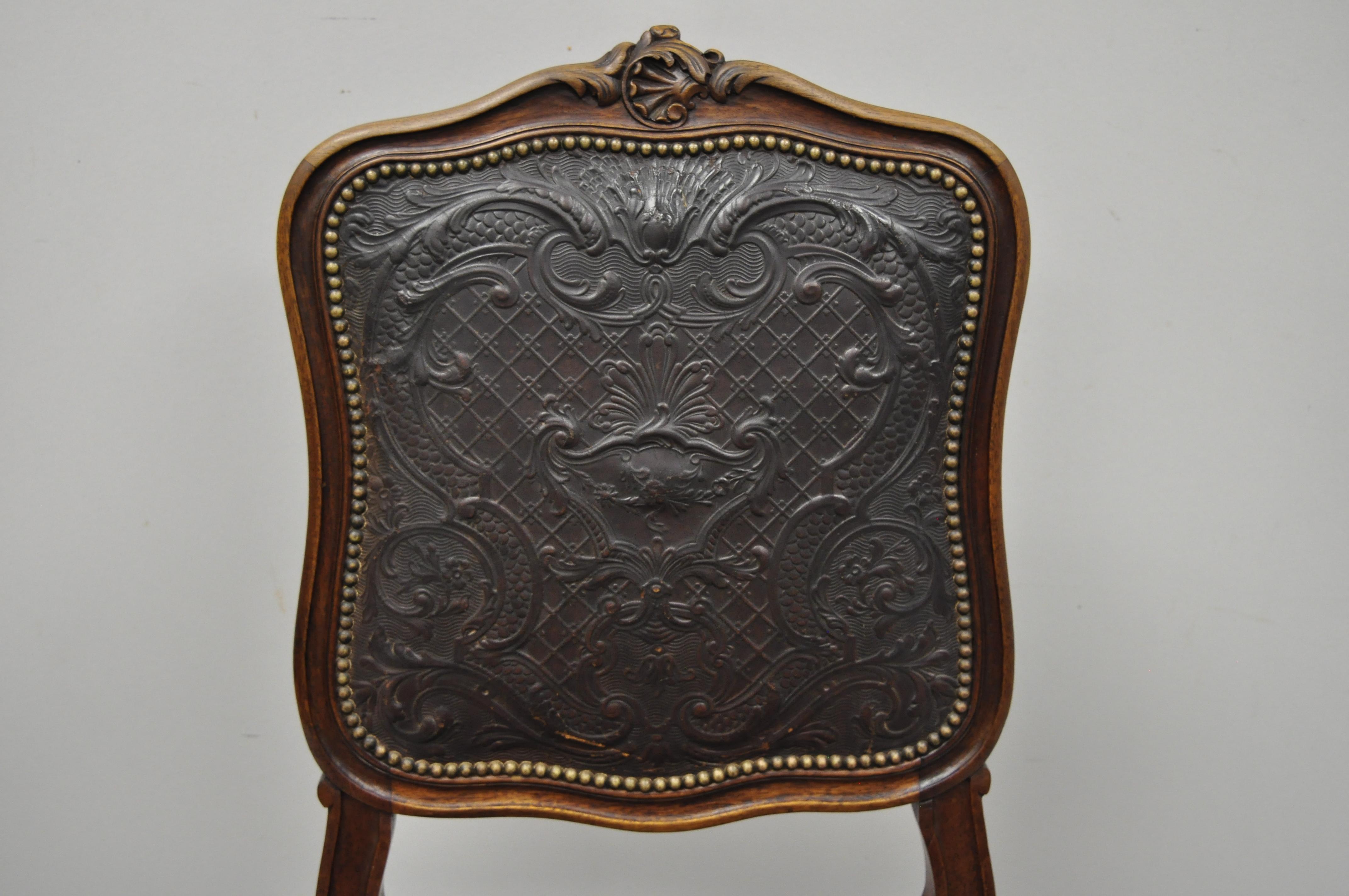 Antique French Louis XV fancy brown embossed leather walnut side chair(A). Item features brown embossed leather back and seat, nailhead trim, solid wood frame, finely carved details, cabriole legs, very nice antique item, great style and form, circa