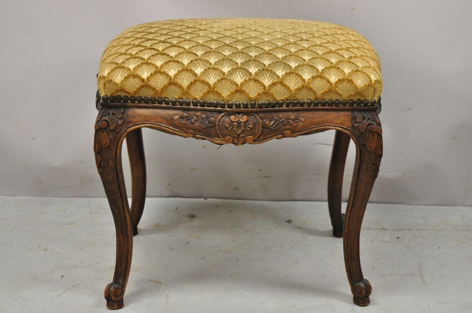 Antique French Louis XV Style Carved Walnut Orange Footstool Ottoman. Item features beautiful wood grain, nicely carved details, cabriole legs, very nice antique item, great style and form. Circa Early 20th Century. Measurements: 18