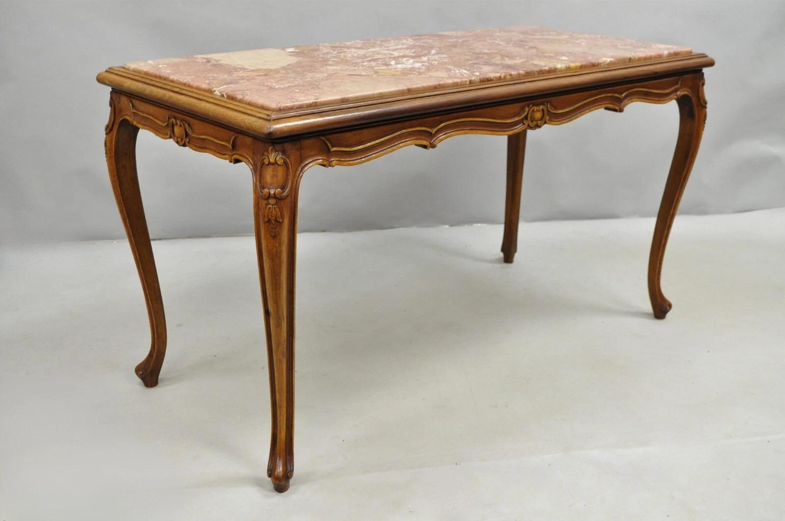 Antique French Louis XV Style Carved Walnut Pink Rouge Marble Top Console Hall Table with Shapely Cabriole Legs. Circa Early 20th Century. Measurements: 25
