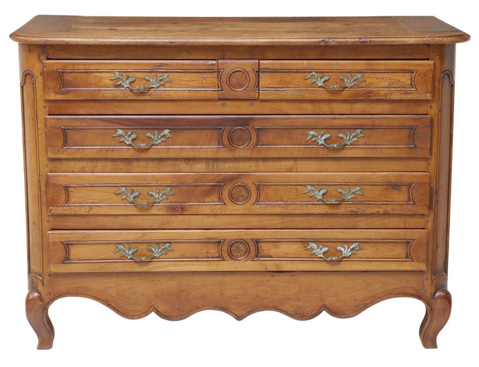 Antique French Louis XV style fruitwood five drawer commode, 18th/19th c. This commode features two short drawers over three long drawers, rising on short cabriole legs, restorations.
Beautiful and rich patina.

Dimensions
approx. 34.25