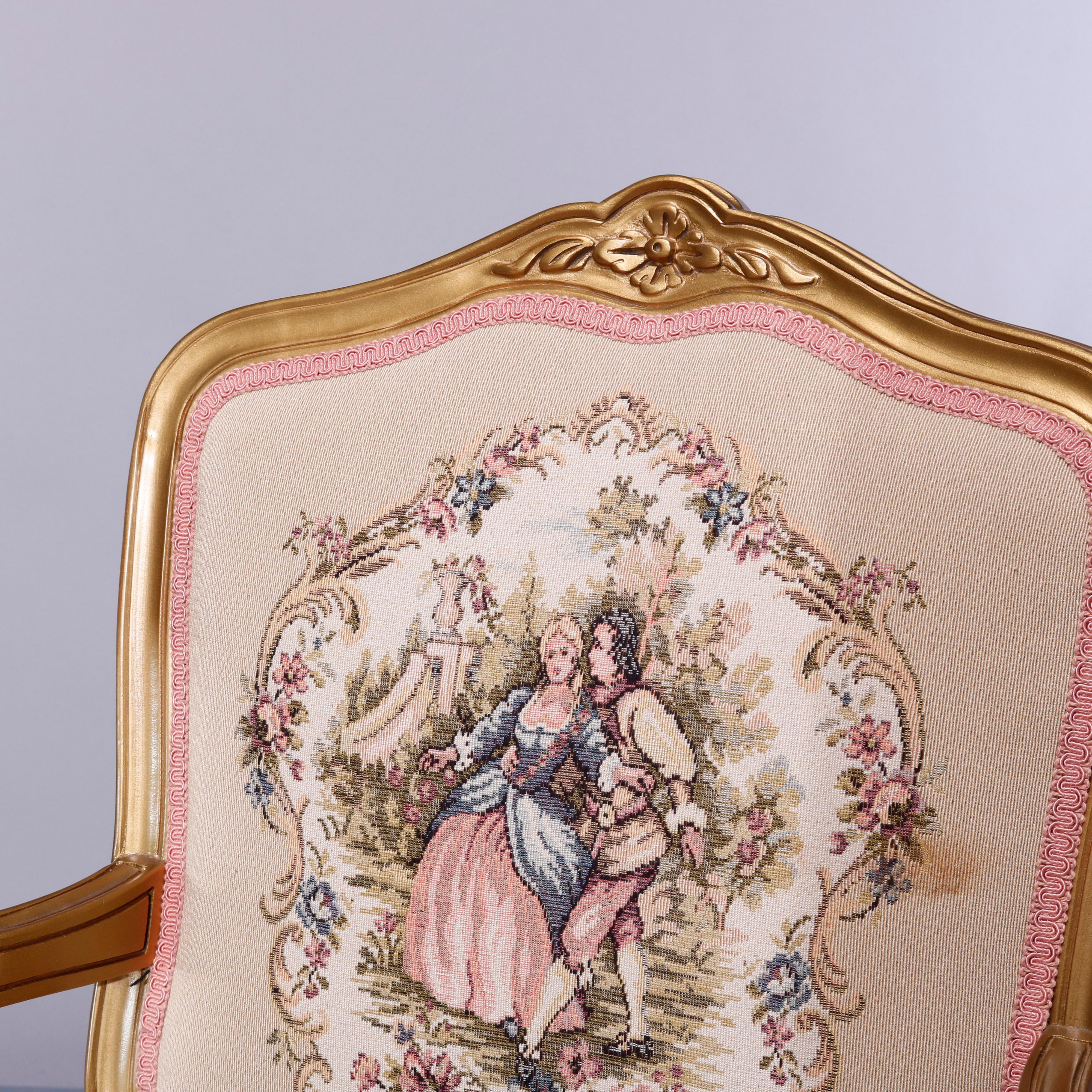 An antique French Louis XV style fauteuil offers giltwood frame with floral crest over back with courting scene tapestry and floral bouquet seat, raised on cabriole legs with carved floral knees and scroll feet, 20th century

Measures: 36.75