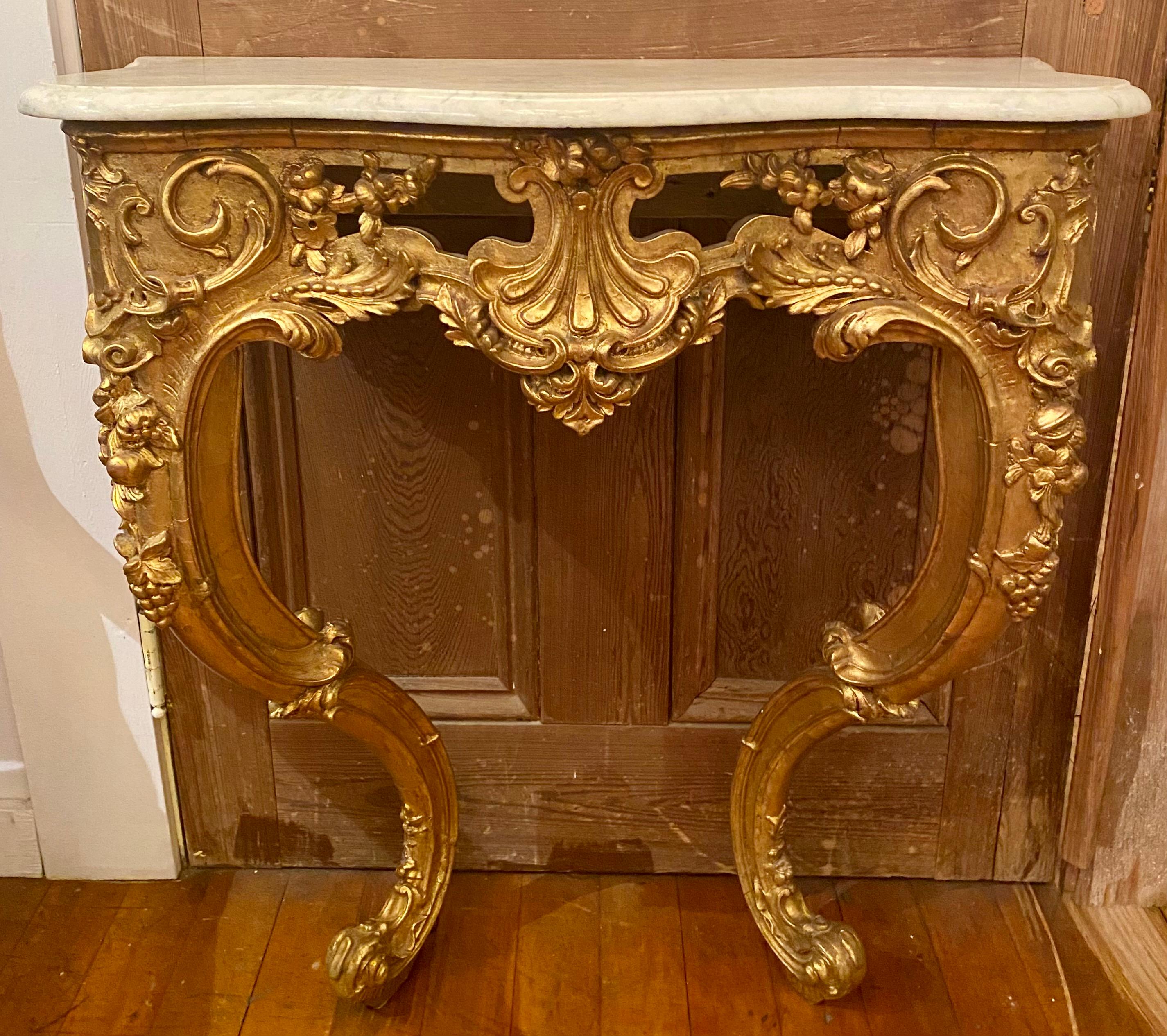 Antique French Louis XV style gold console with white & grey marble top, Circa 1910-1920.