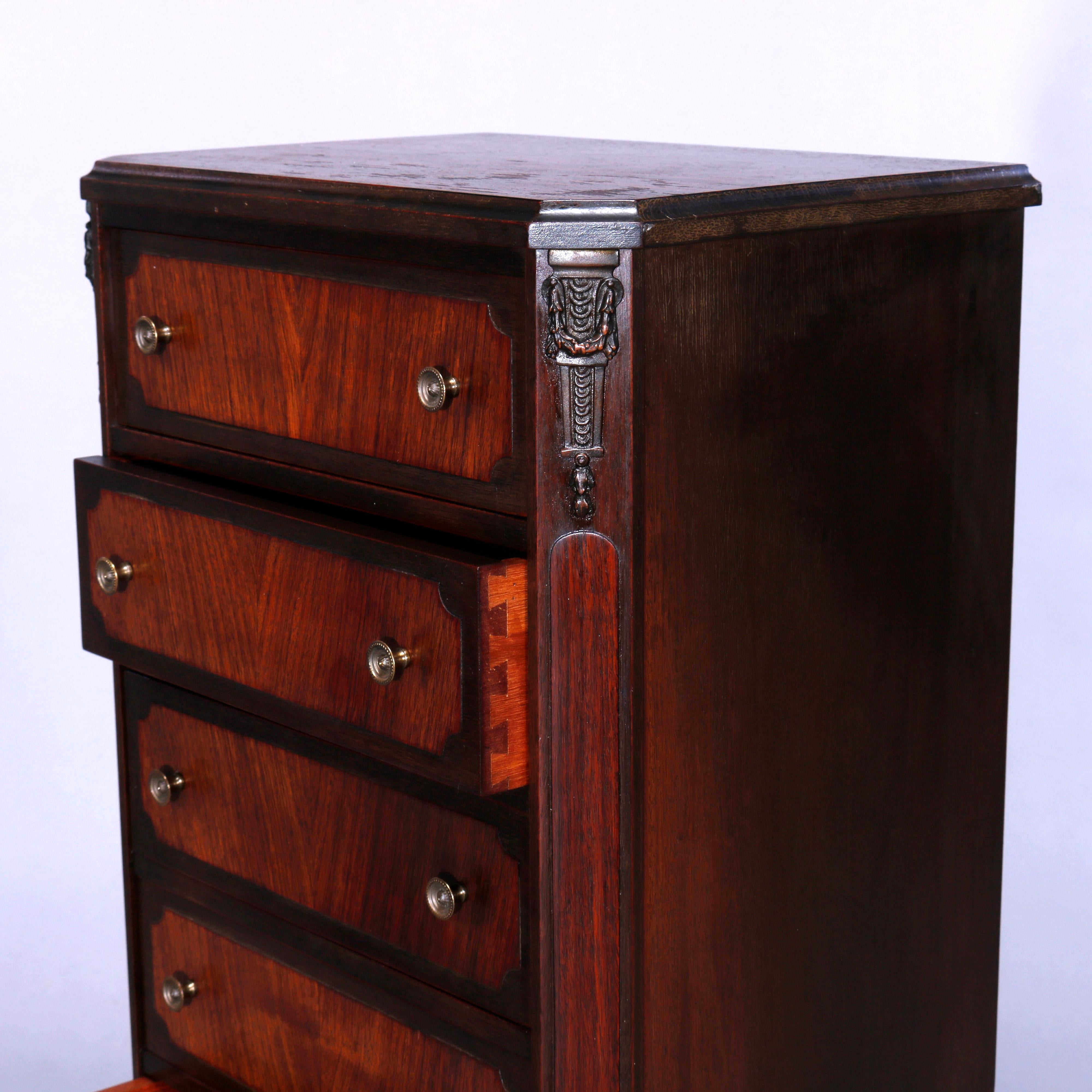 An antique French Louis XV lingerie chest offers chest tower with eight drawers with bookmatched kingwood facing, raised on stylized cabriole legs, carved foliate elements throughout, c1920

Measures - 42.5''H x 16''W x 11.25''D.