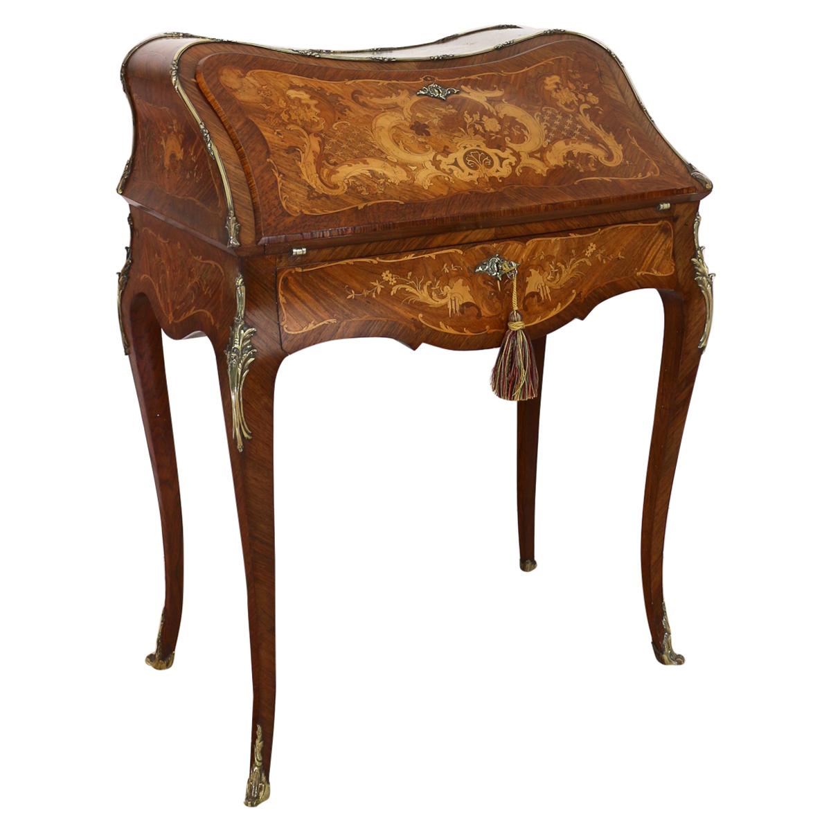 Ancien bureau de dame français de style Louis XV en bois de roi et marqueterie