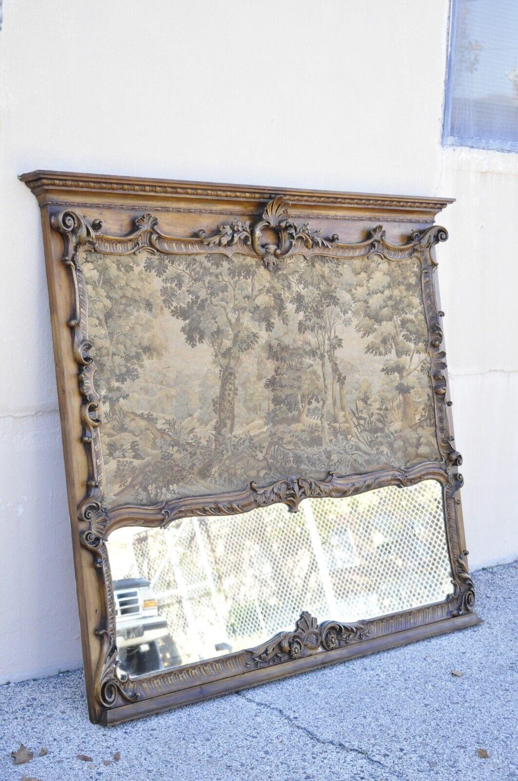 Antique French Louis XV Style Large Overmantle Trumeau Mirror with Tapestry. Item features a large impressive size, relief carved frame, French tapestry to upper, lower central mirror, very nice antique item, quality French craftsmanship, great