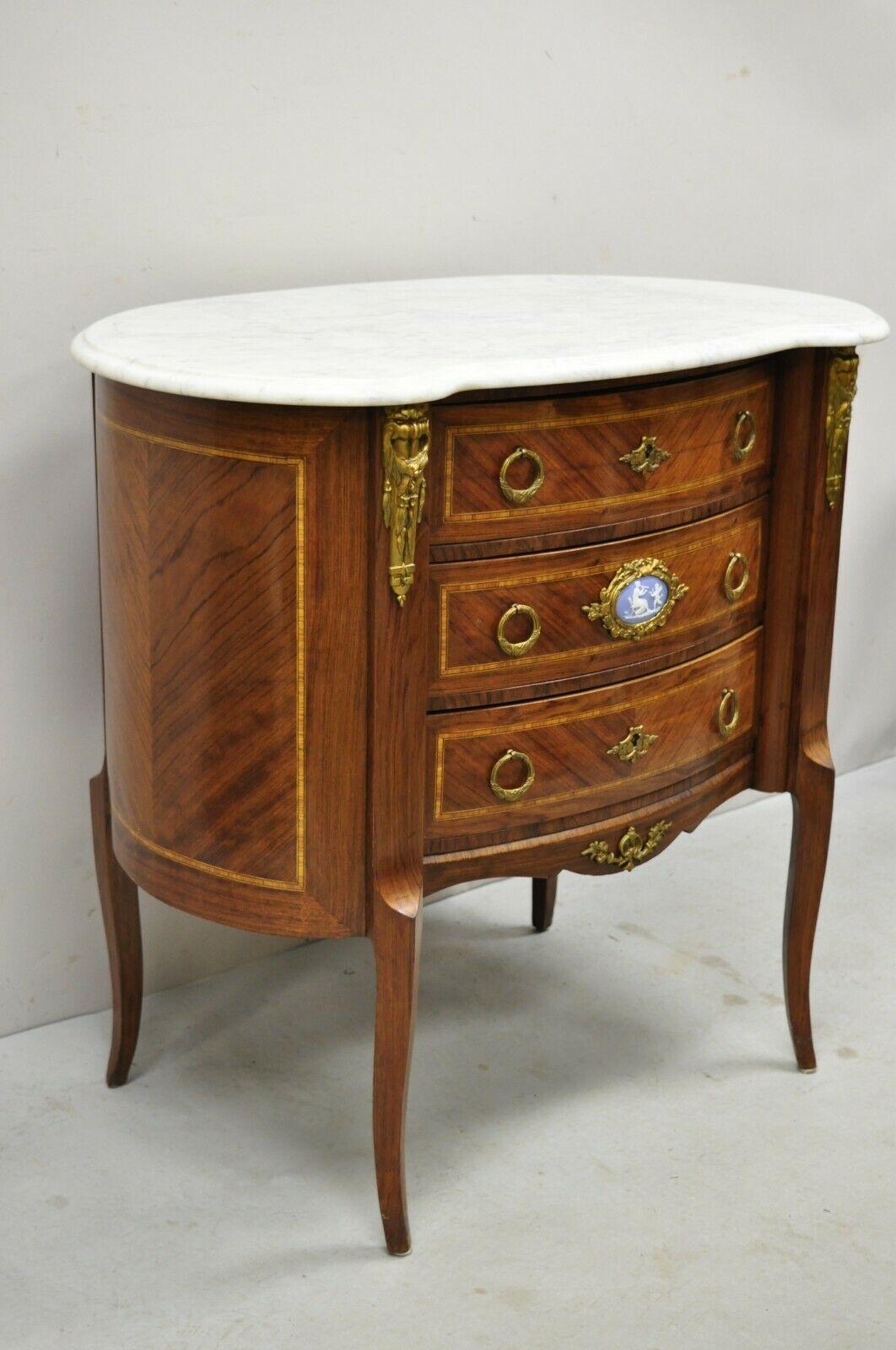 Antique French Louis XV style marble top Bombe Commode nightstand bronze ormolu. Item features nice larger size, white marble top, shapely bombe form, stunning inlay, bronze ormolu, jasperware cameo central plaque, quality French craftsmanship.