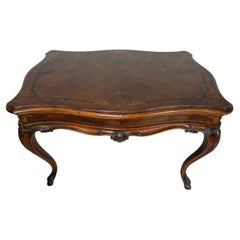 Antique French Louis XV style marquetry coffee table, in sculpted walnut