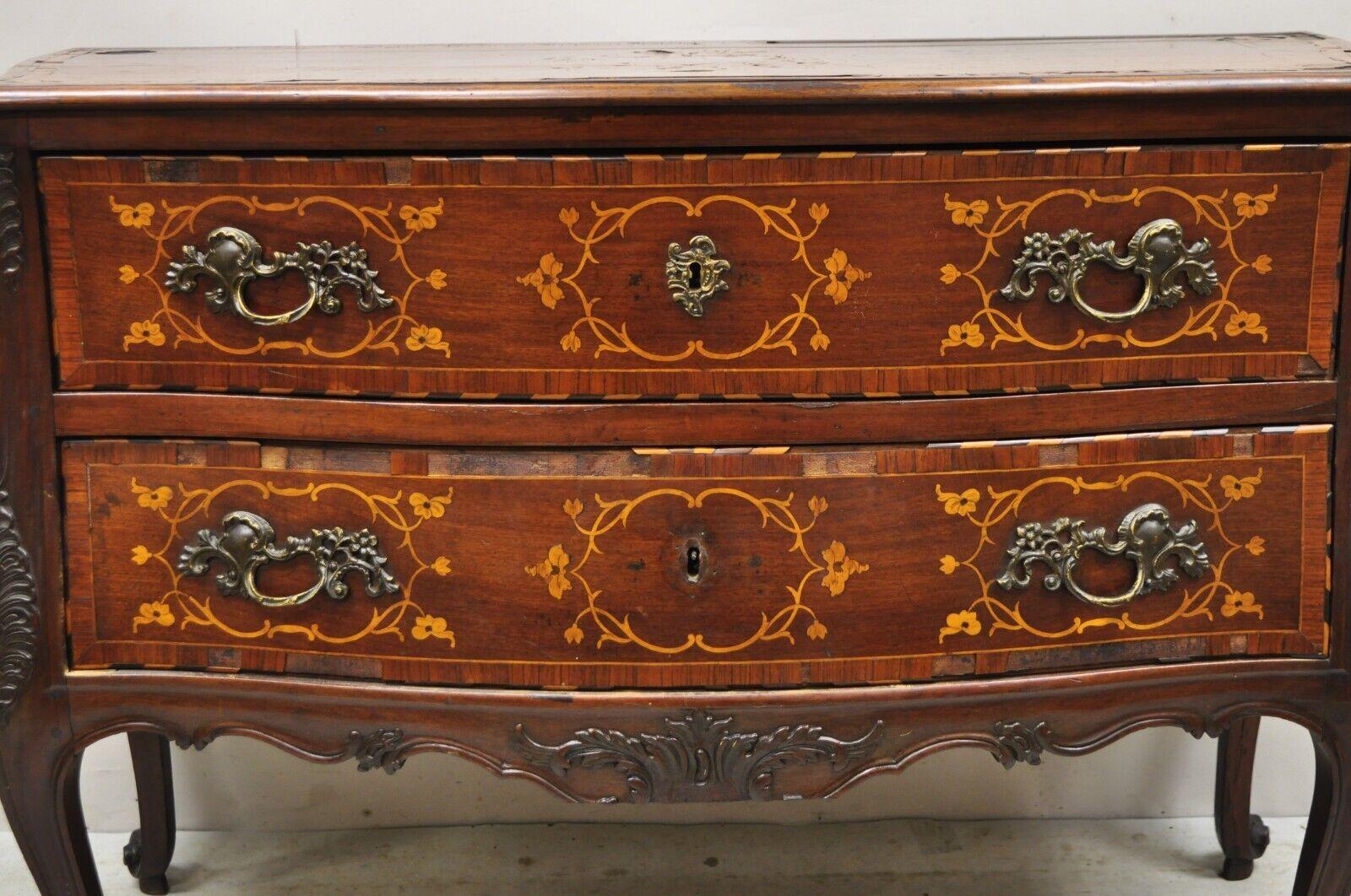 Antique French Louis XV Style Marquetry Inlay Bombe Commode Chest of Drawers. Item features marquetry inlay throughout (with numerous losses), shapely bombe form, ornate hardware (some missing), beautiful wood grain, nicely carved details, 2