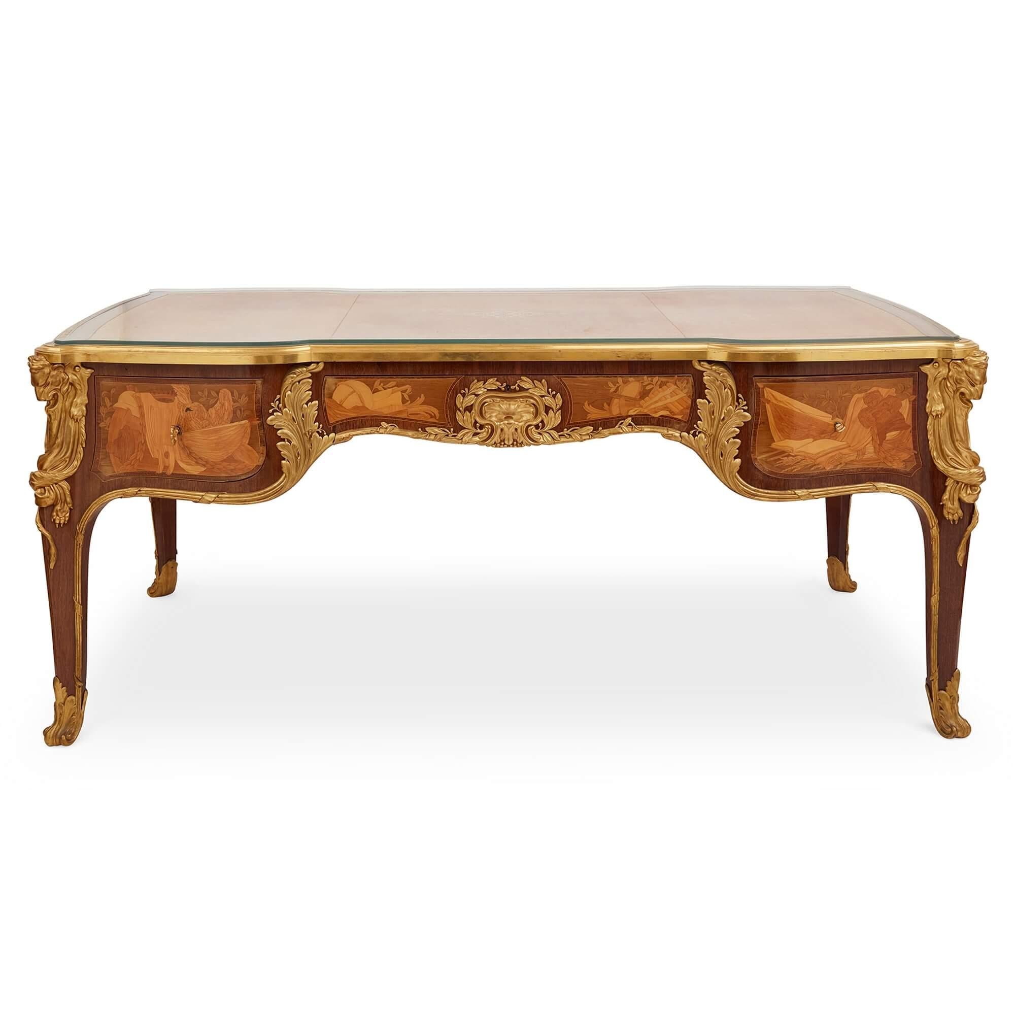 Antique French Louis XV style ormolu mounted marquetry desk by Maison Léger
French, c. 1880
Height 80cm, width 185cm, depth 98cm

This very impressive desk was crafted around 1880 by Maison Léger who was an award-winning French firm of