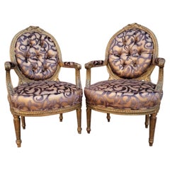 Paire d'anciens fauteuils Fauteuil en bois doré sculpté de style Louis XV