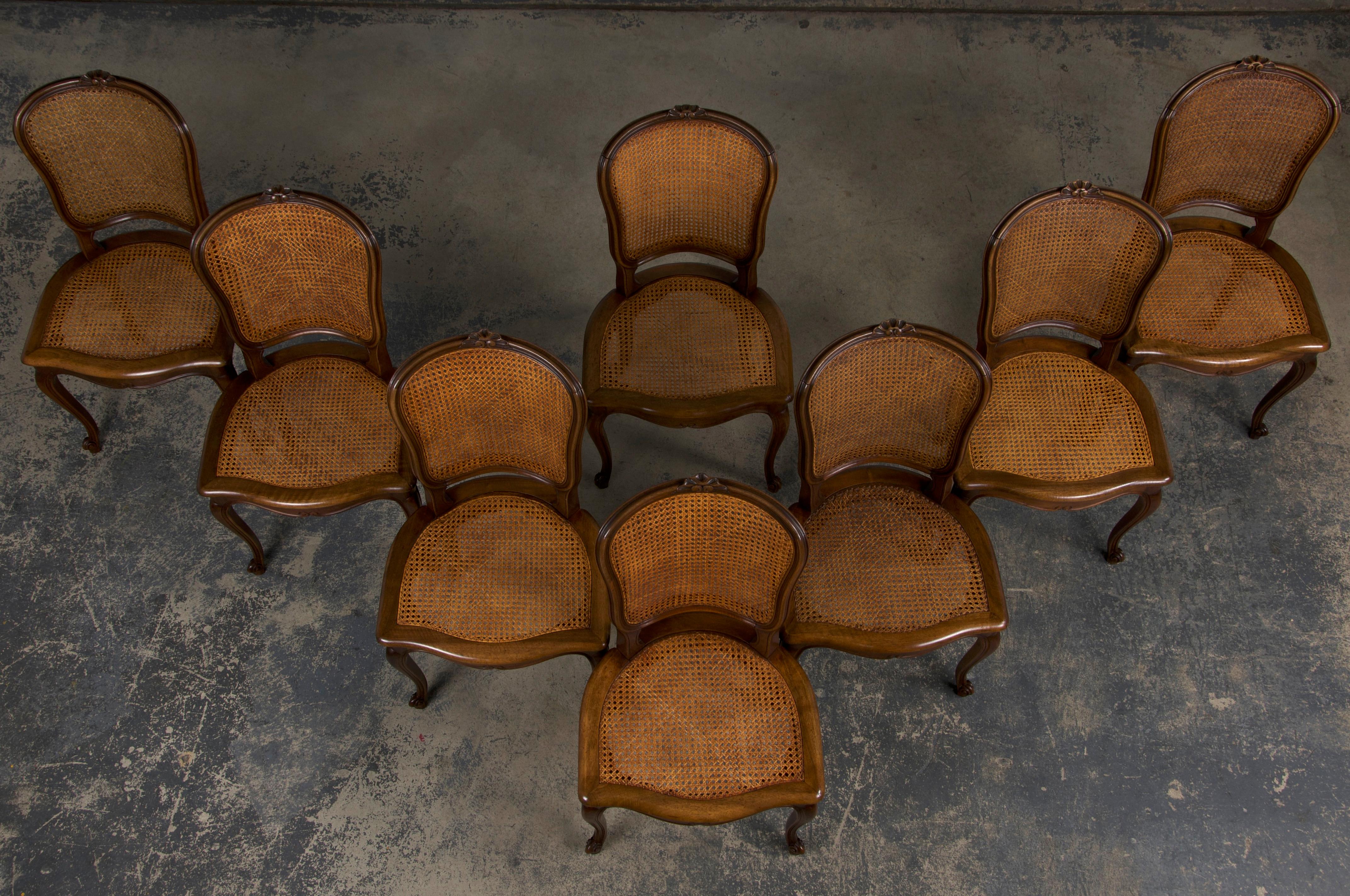 Hand-Carved Antique French Louis XV Style Provincial Walnut and Cane Dining Chairs- Set of 8