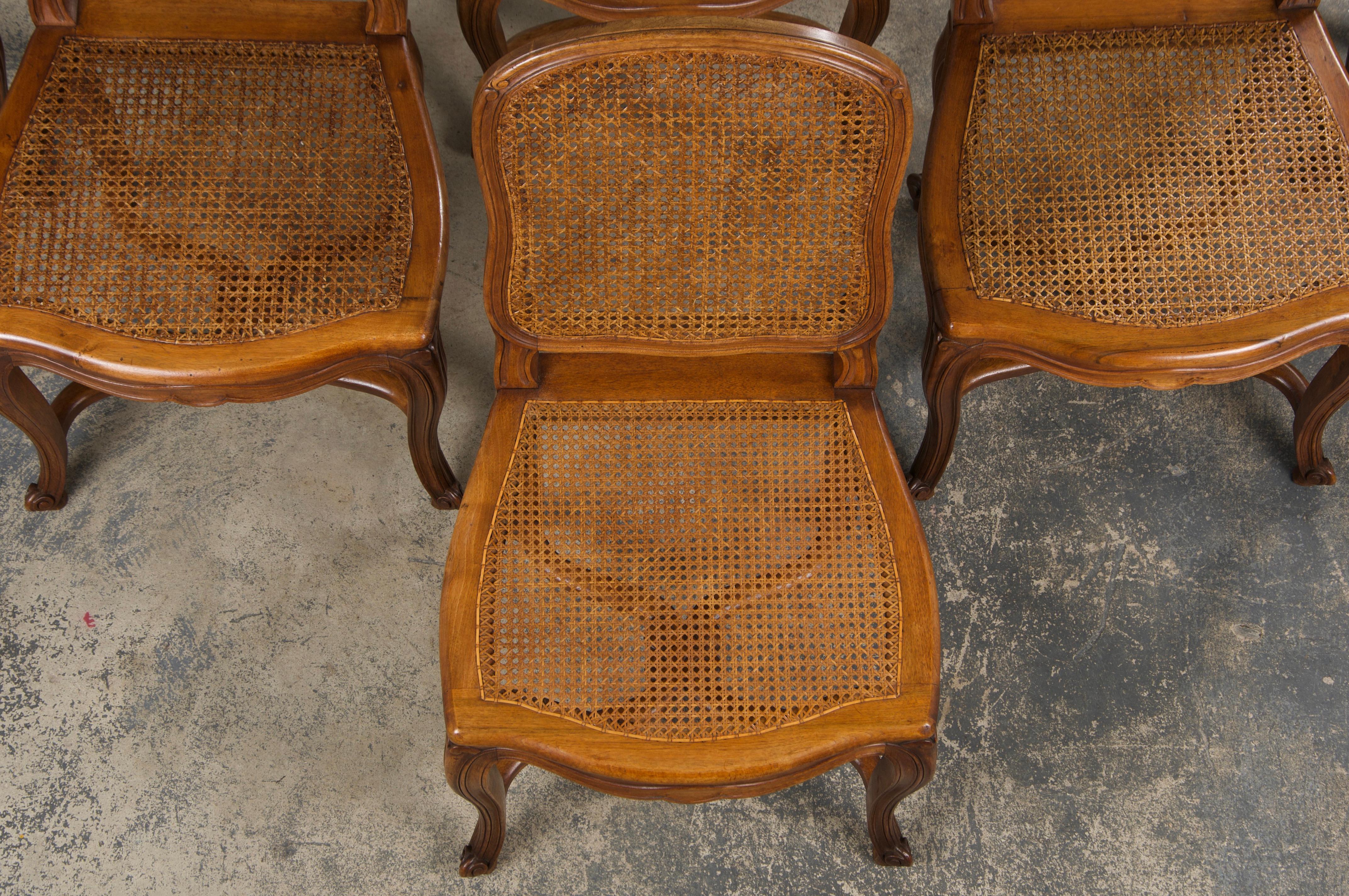 Antique French Louis XV Style Provincial Walnut Cane Dining Chairs - Set of 6 In Good Condition In Astoria, NY