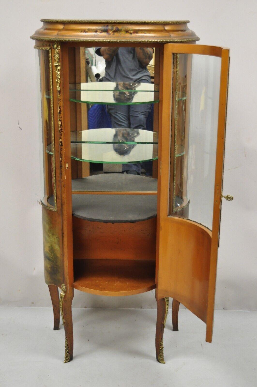 small curio cabinet with glass doors