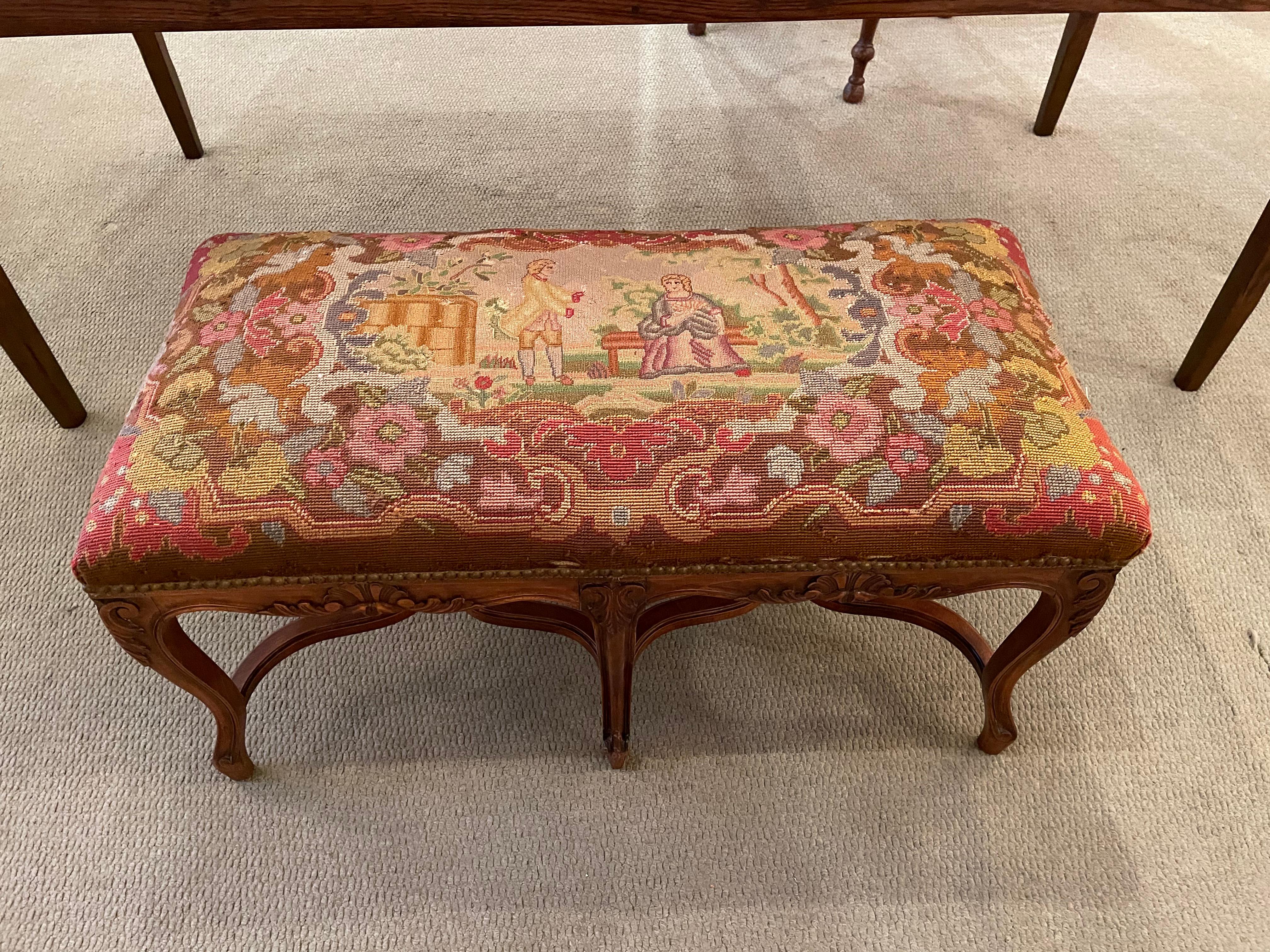 Antique French Louis XV style walnut bench.