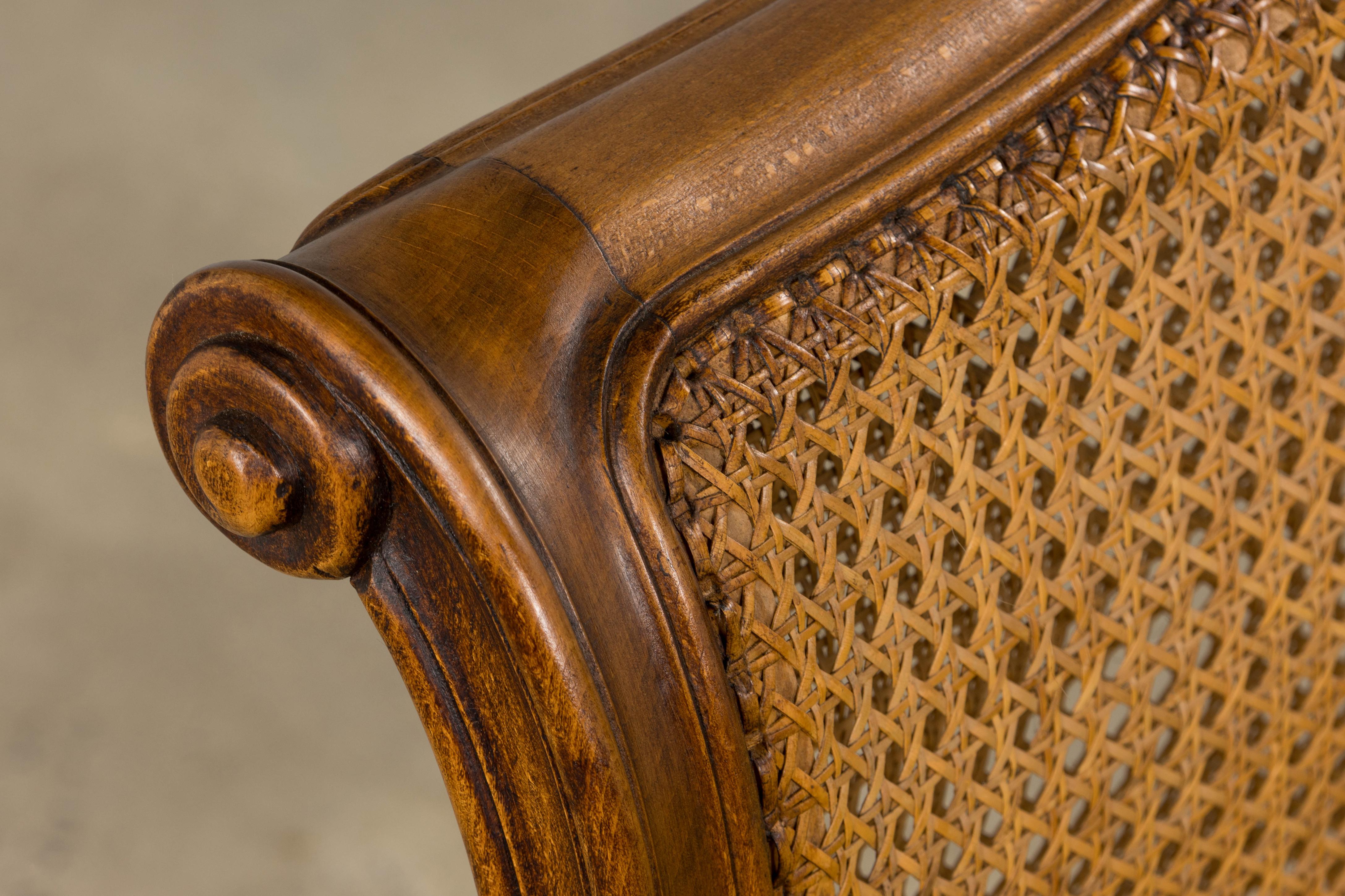 Hand-Carved Antique French Louis XV Style Walnut Cane Daybed W/ Light Green Linen For Sale