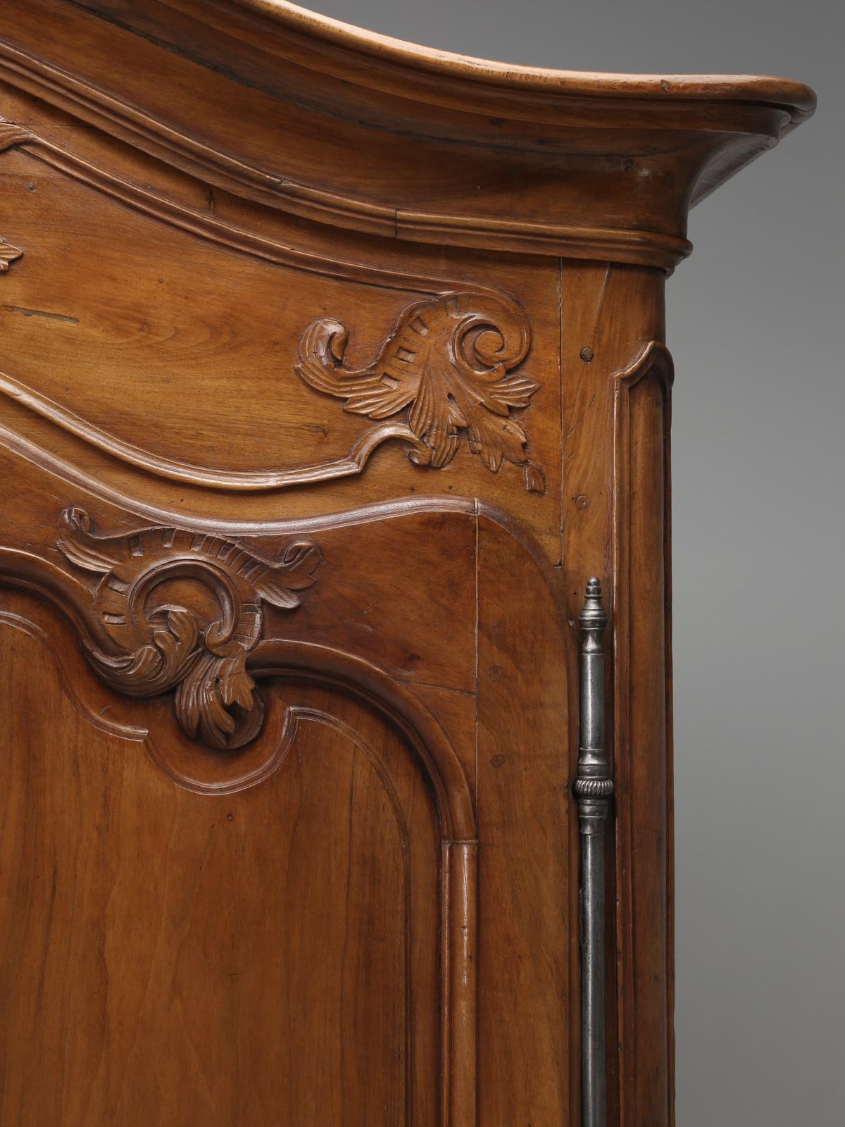 Hand-Carved Antique French Large Louis XV Walnut Armoire, c1700's Restored Pierced Fretwork For Sale