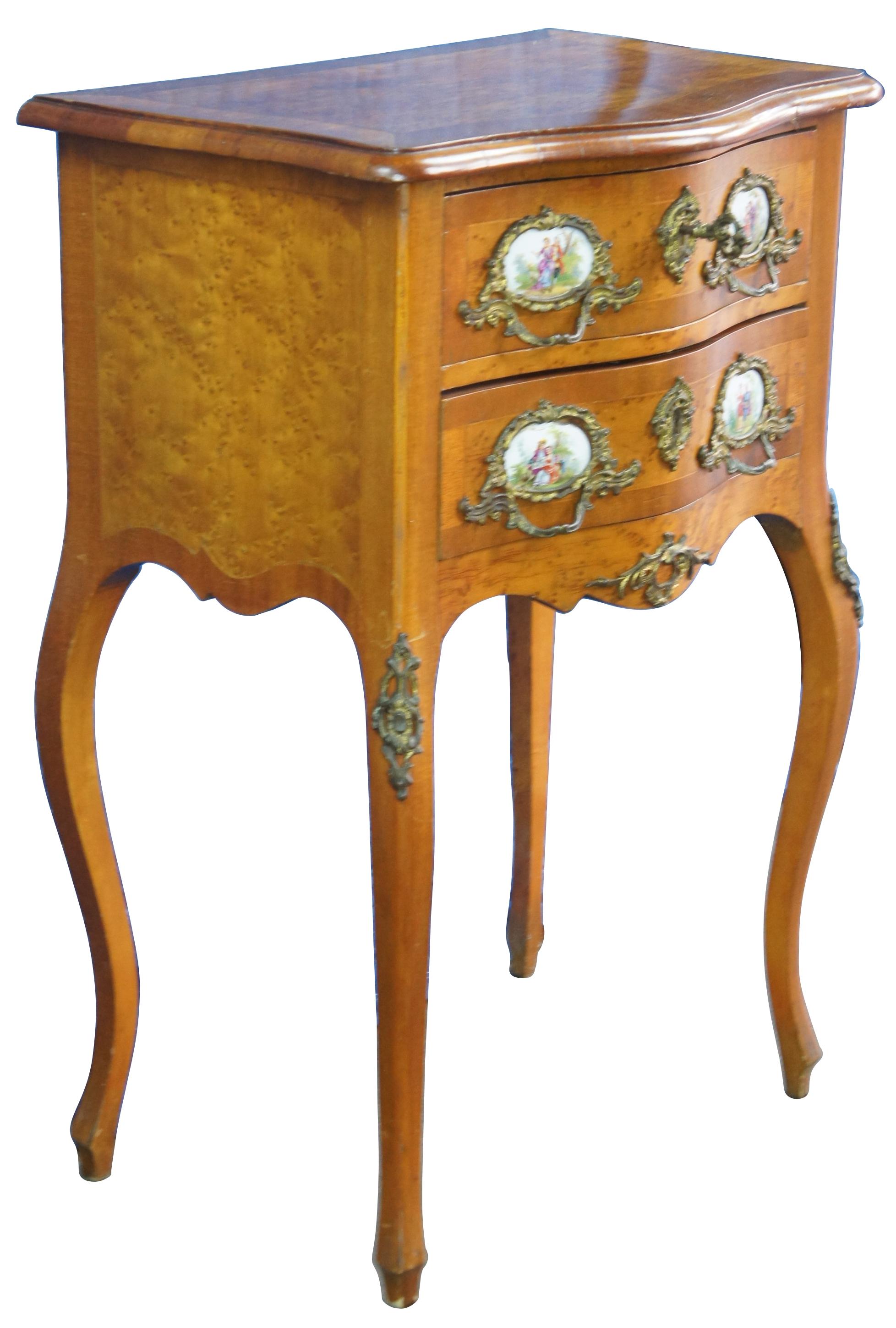 Antique French Louis XV / Napoleon III 2 drawer nightstand or chest, circa last half 19th century. Made of walnut and birdseye featuring serpentine form with two dovetailed drawers, bronze ormolu and classical painted porcelain sevres style plaques