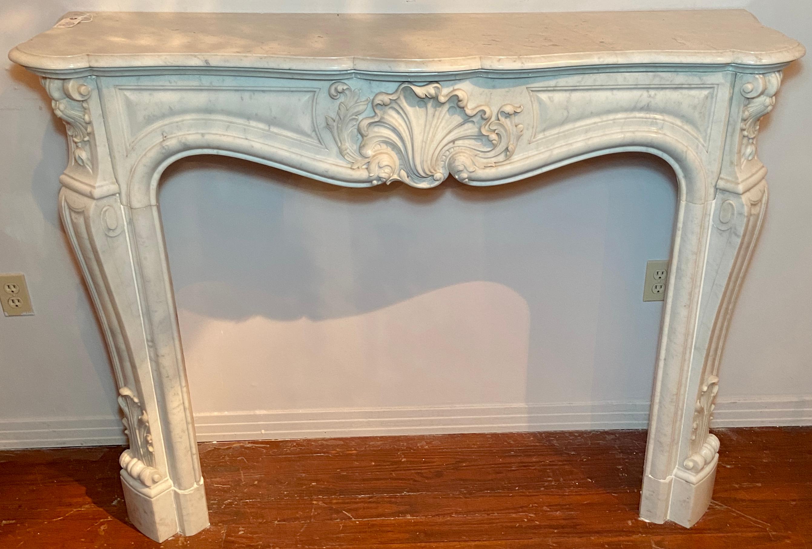 Antique French Louis XV white and grey marble mantel, Circa 1860-1880.