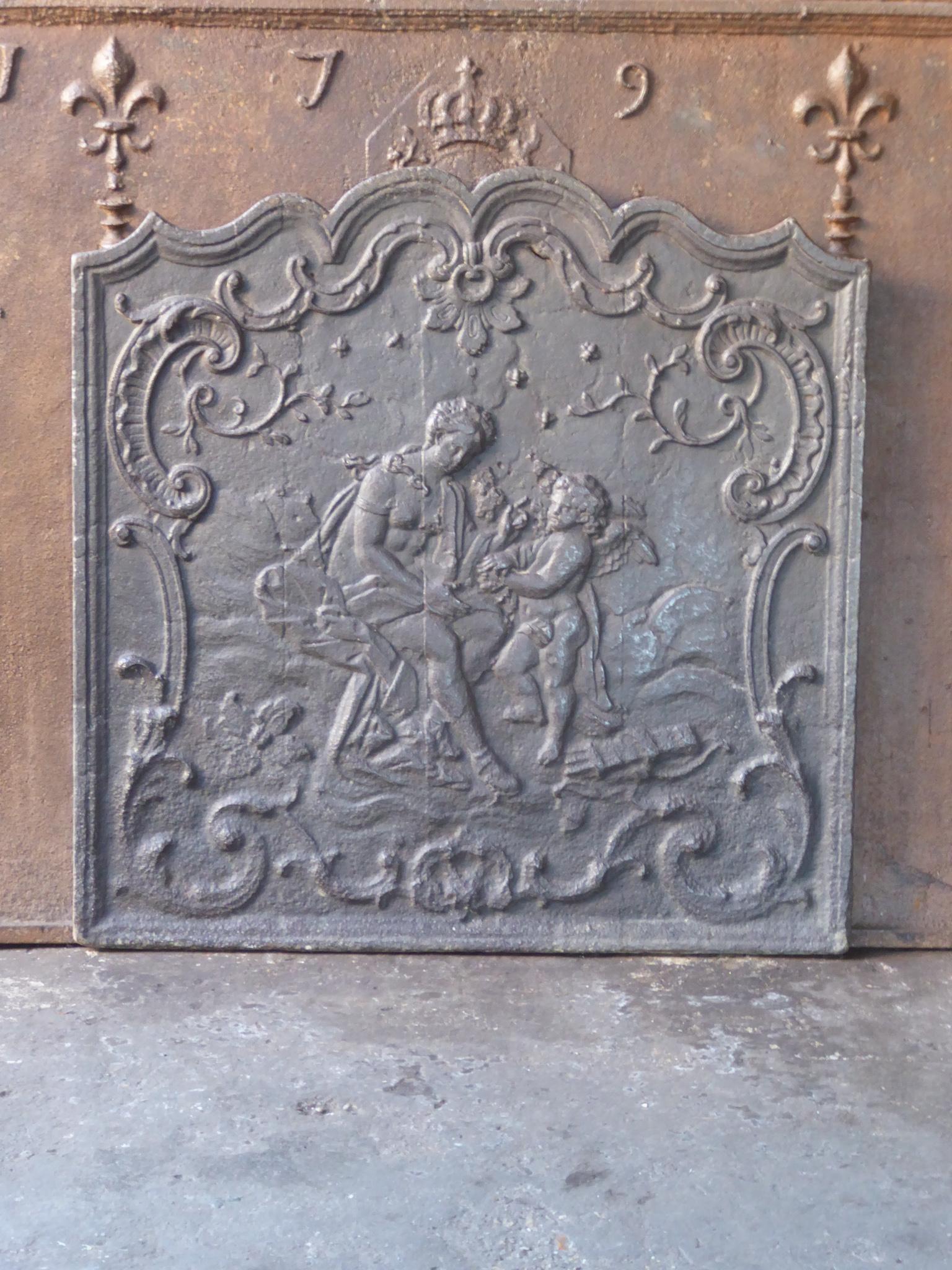 18th century French Louis XV period fireback with a woman and a cupid.

The fireback is made of cast iron and has a natural brown patina. Upon request it can be made black / pewter. It is in a good condition and does not have cracks.

This product