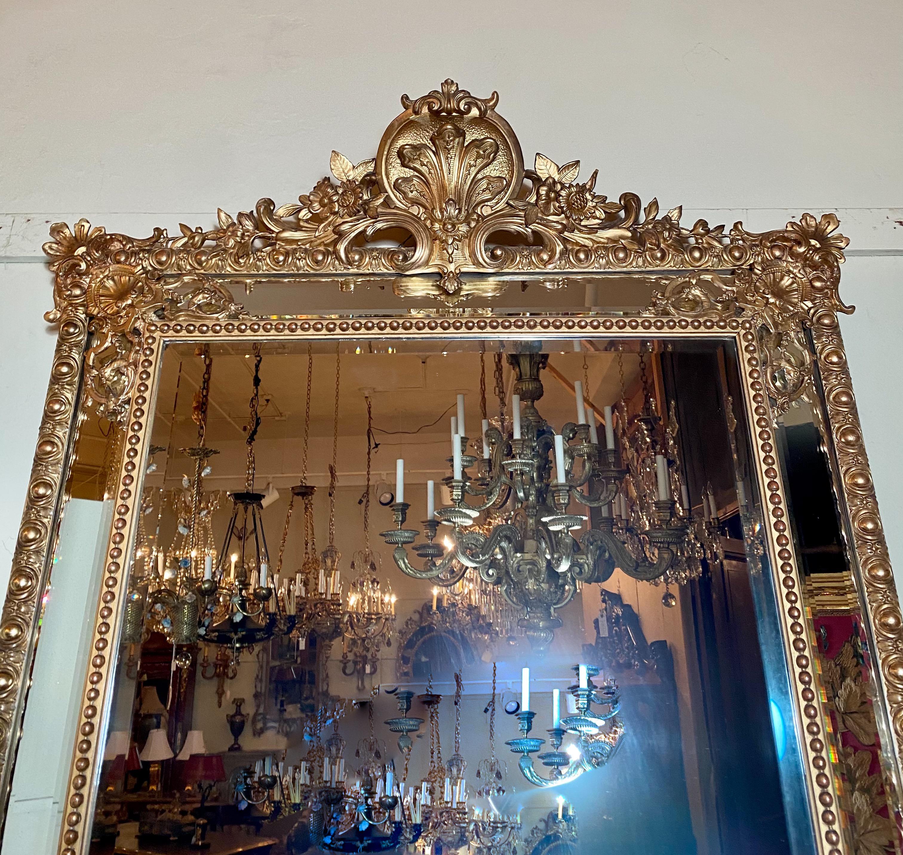 Antique French Louis XVI beveled mirror, circa 1880.

  