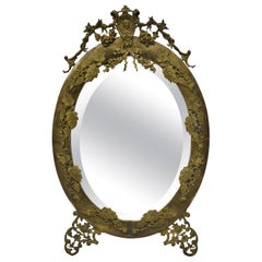 Ancien miroir français de style Louis XVI avec cadre en laiton et verre biseauté et bronze doré