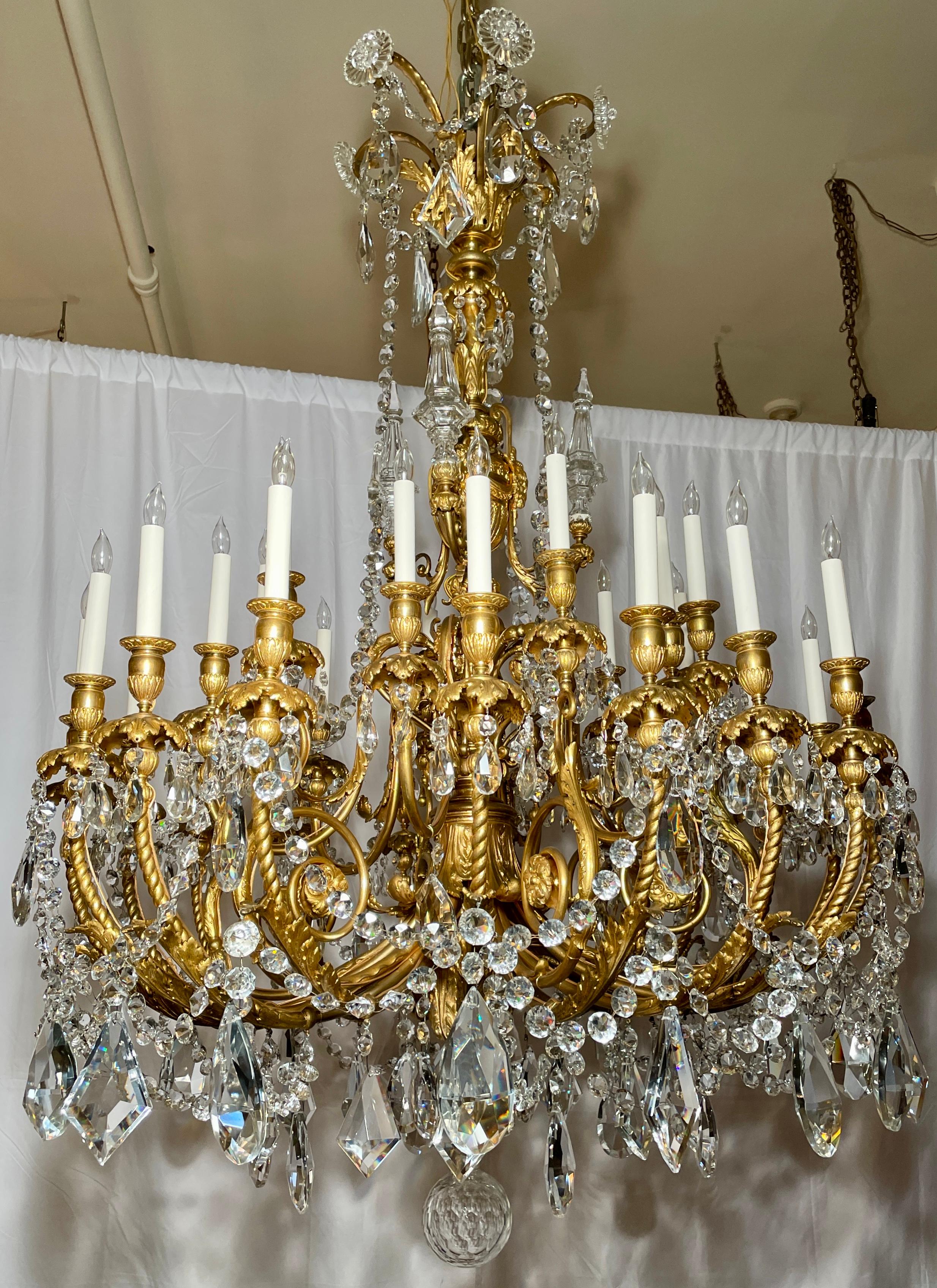 Magnificent Antique French Louis XVI bronze D' Ore and Baccarat crystal chandelier, circa 1865-1885.
Finest Gold Bronze and Baccarat Crystal