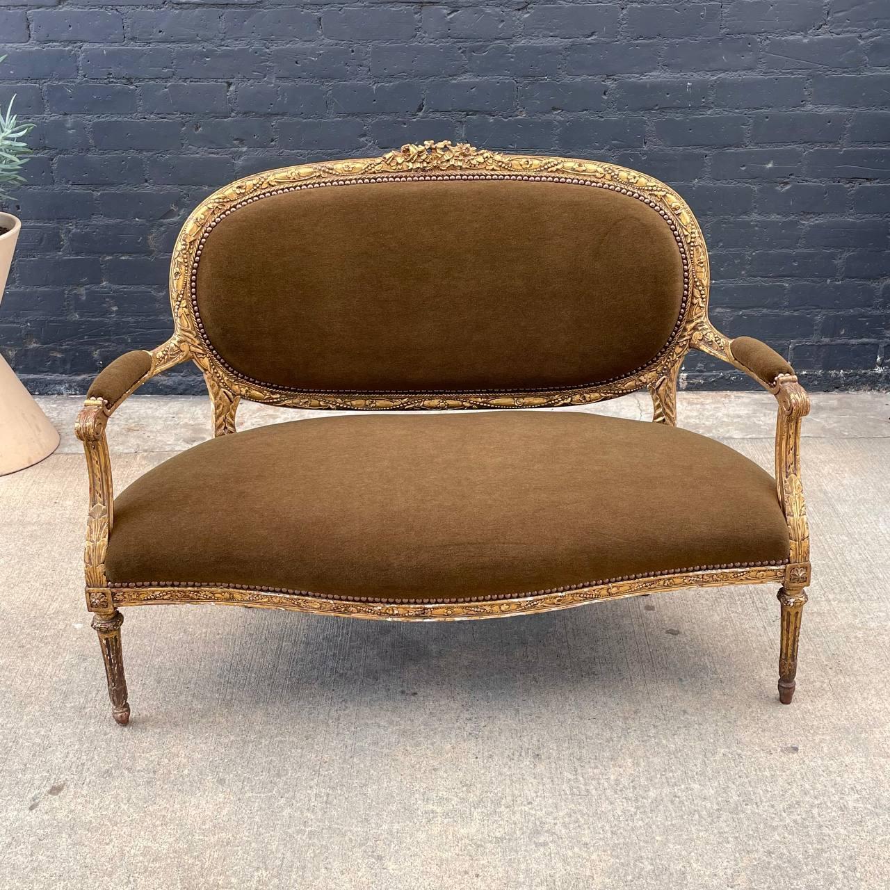 Antique French Louis XVI  Carved Gold Leaf & Alpaca Mohair Sofa 

Country: France
Materials: Carved Gold-Leaf Wood, New Alpaca Mohair 
Condition: Newly Reupholstered, New Alpaca Mohair 
Style: French Louis XVI 
Year: 1920’s

$4,895

Dimensions:
39”H