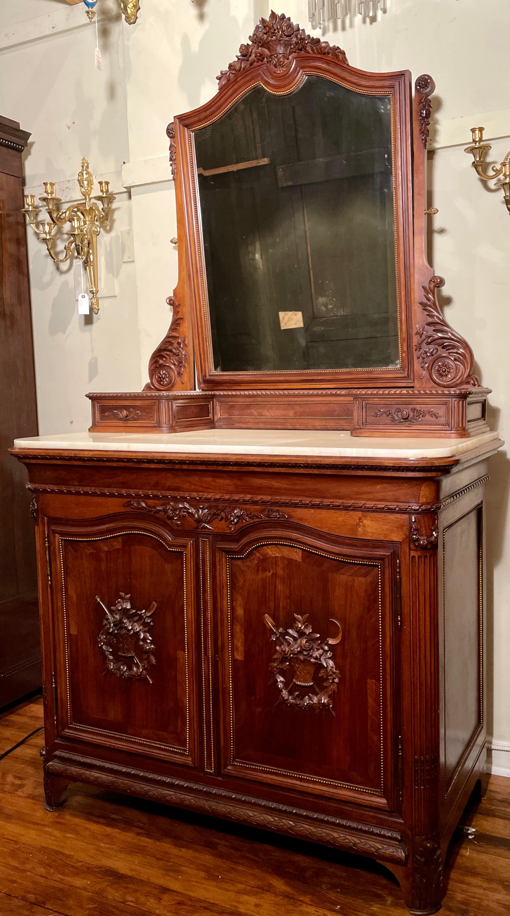 Antique French Louis XVI carved mahogany marble top dresser with mirror, circa 1890.