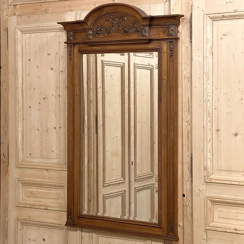 Beveled Antique French Louis XVI Carved Walnut Mirror For Sale