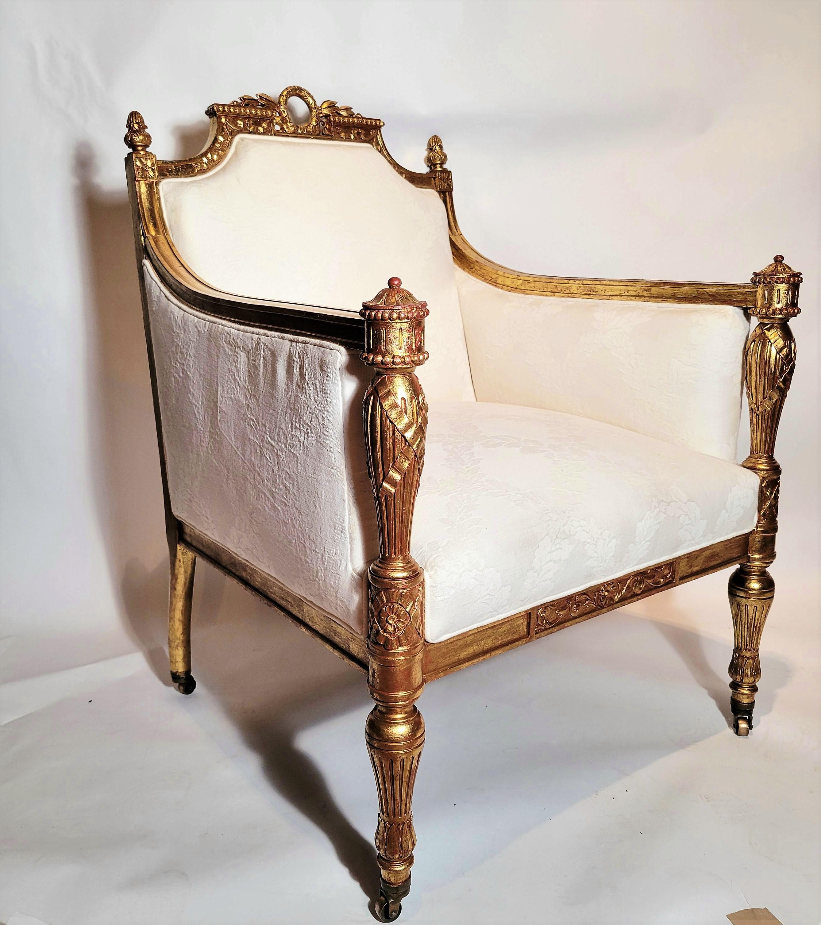 This chair is very comfortable and has handsome gold leaf. 