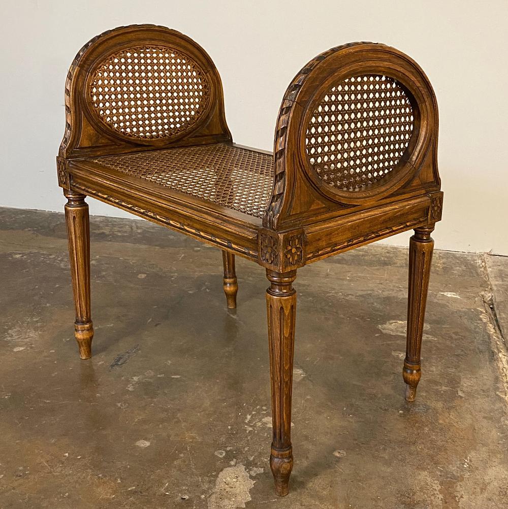 Antique French Louis XVI fruitwood caned Armbench ~ Vanity bench is a delightful example of neoclassical styling combined with form and function to create the perfect lightweight armbench for use anywhere in the home, but ideal for the vanity. Oval