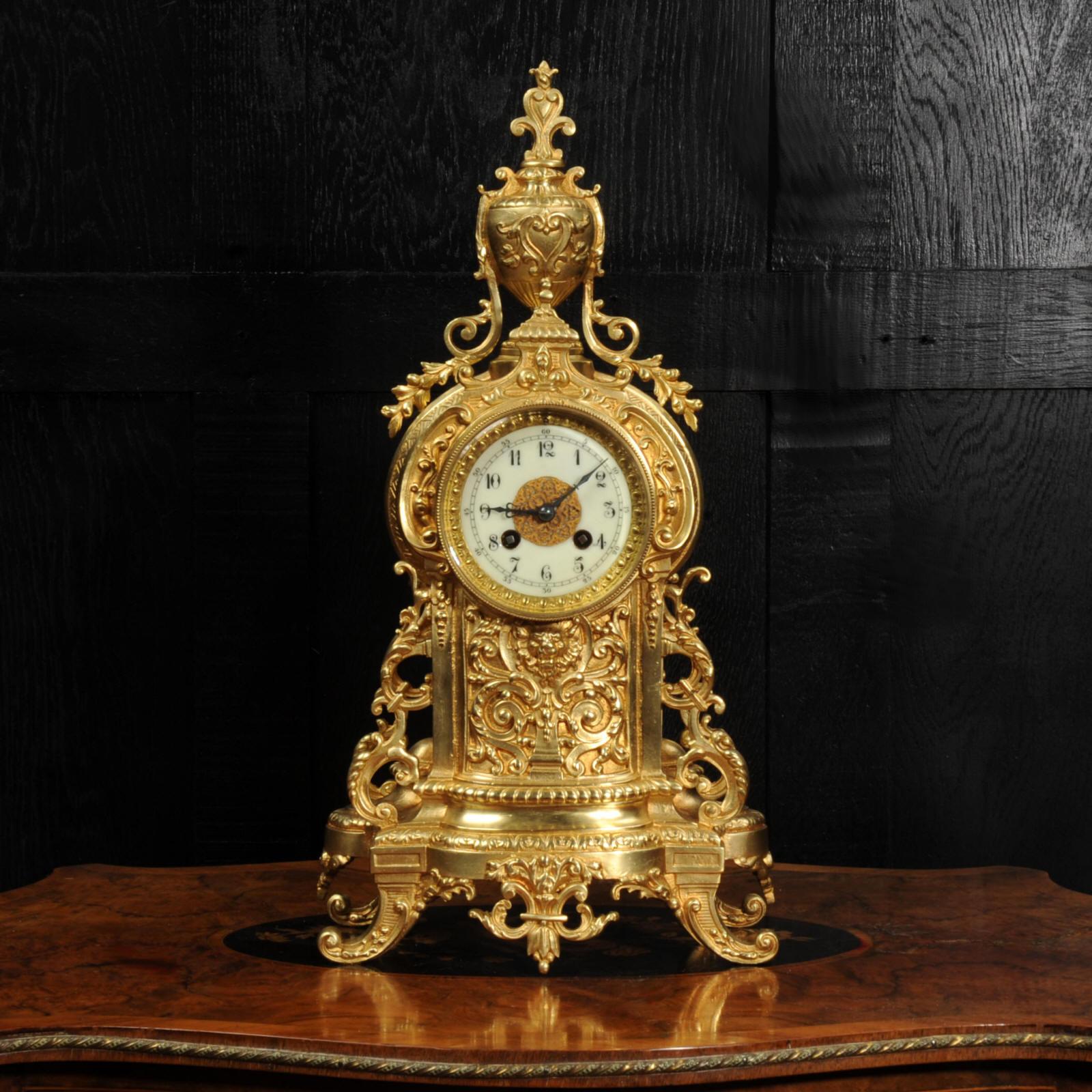 ~ French - circa 1880 ~

~~ Excellent condition, fully overhauled ~~

A stunning original antique French gilt bronze clock in the neoclassical style of Louis XVI. Profusely decorated with scrolls and foliage, standing on acanthus bracket feet