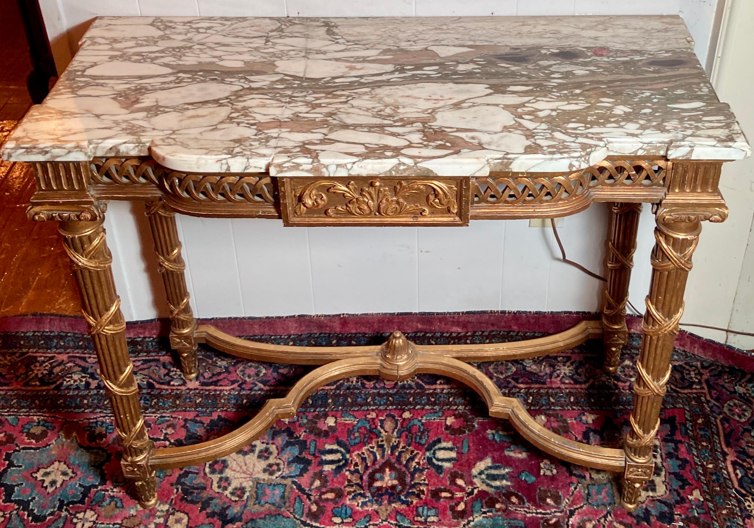 Antique French Louis XVI gilt wood and white & grey marble-top console, Circa 1880.
This console is typical of the fetching lines of the Louis XVI style and has a nicely mottled marble top.