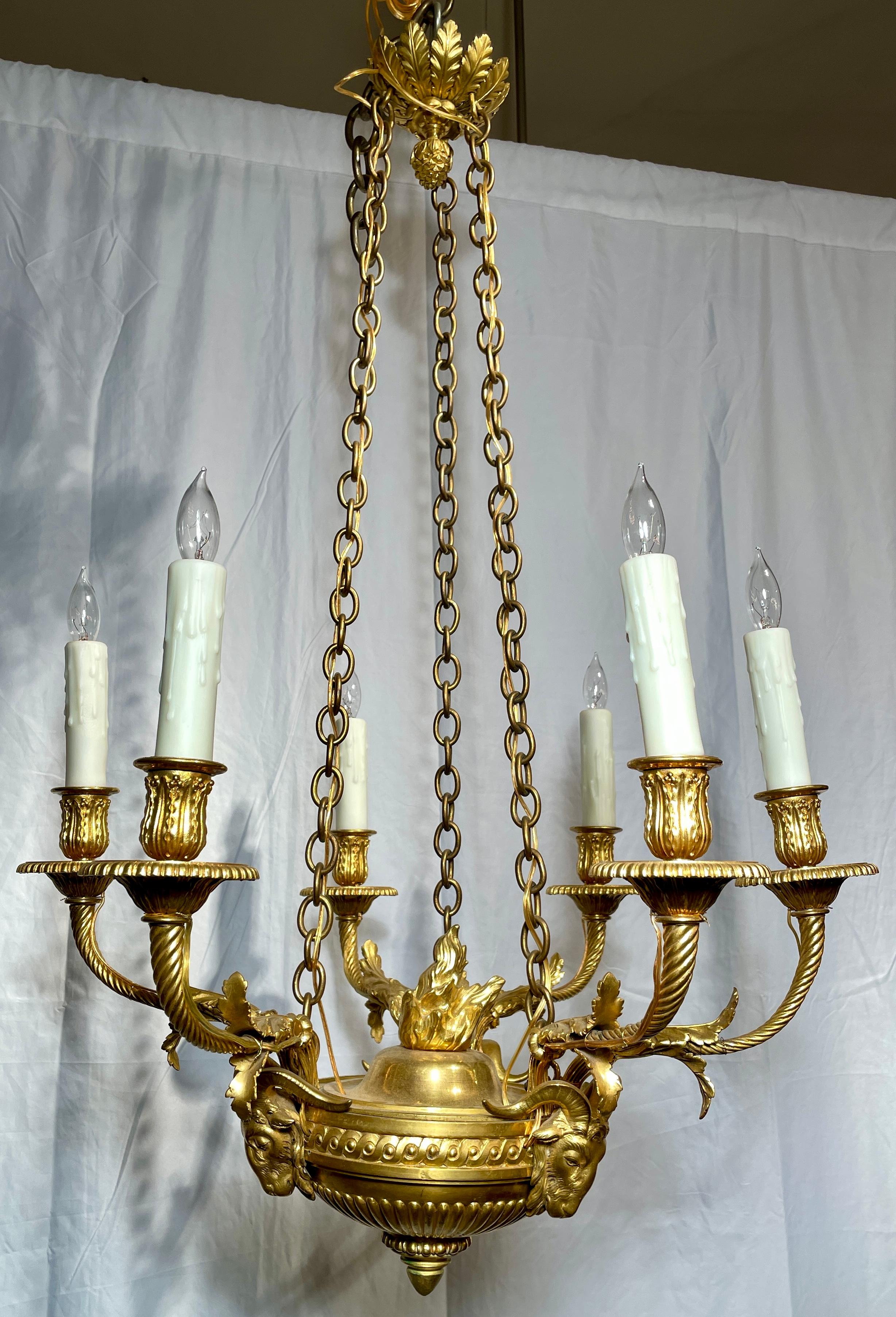 Antique French Louis XVI gold bronze 6-light chandelier, Circa 1880.
  