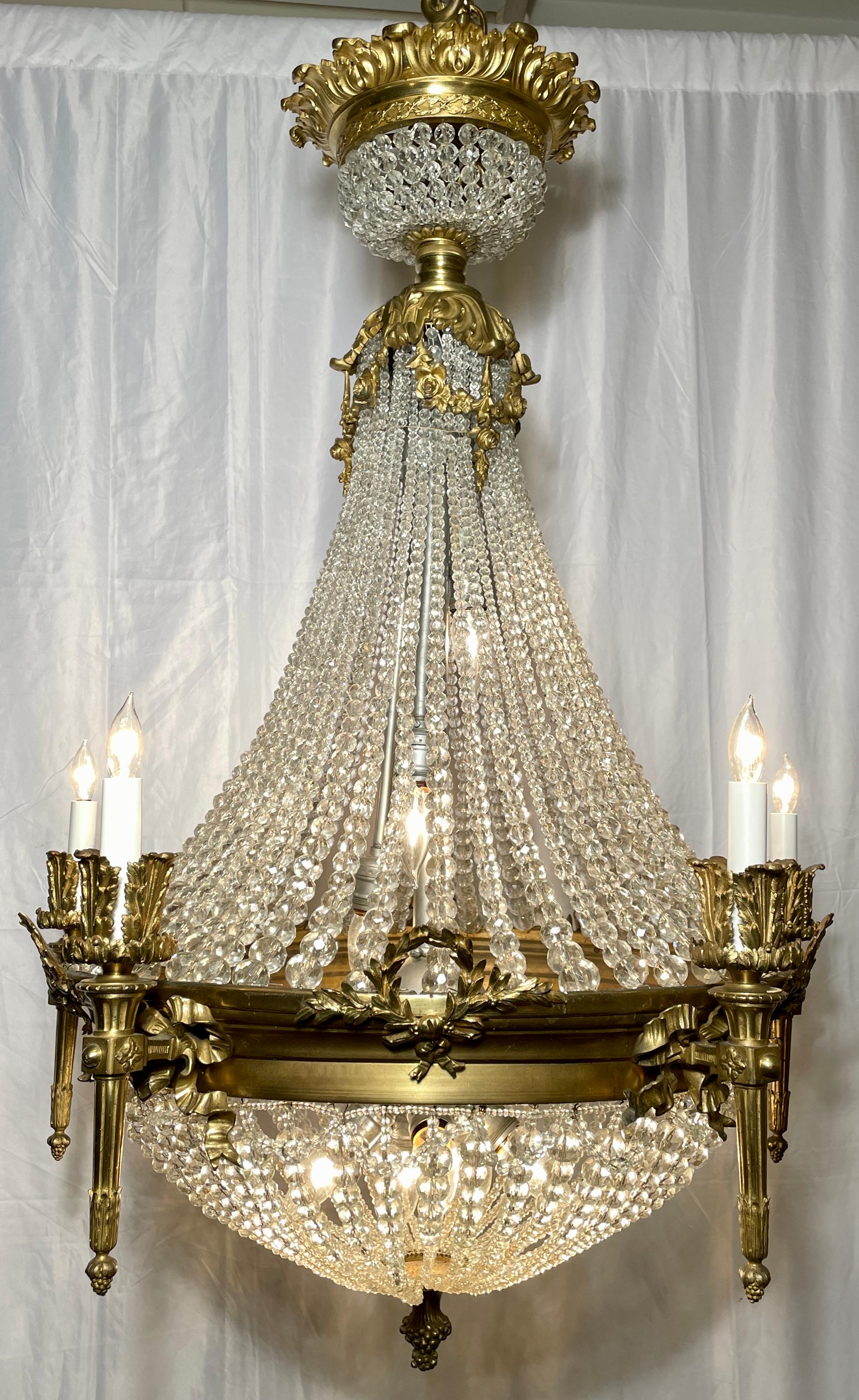 Antique French Louis XVI gold bronze and cut crystal chandelier, circa 1890.