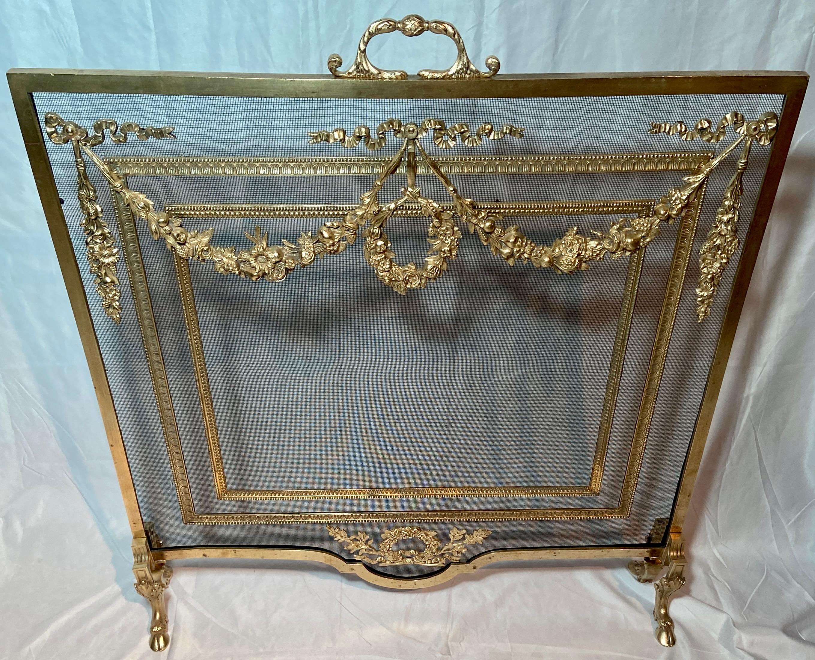 Antique French Louis XVI gold bronze firescreen, Circa 1880. 
Typical of the Louis XVI design, and very handsome.