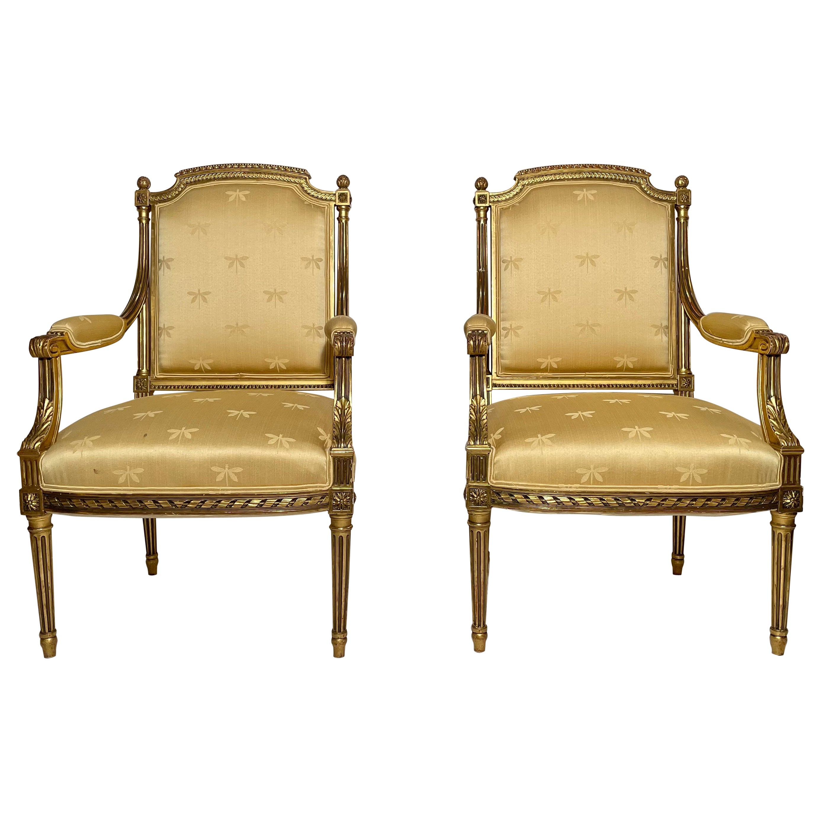 Fauteuils français anciens Louis XVI à feuilles d'or en vente