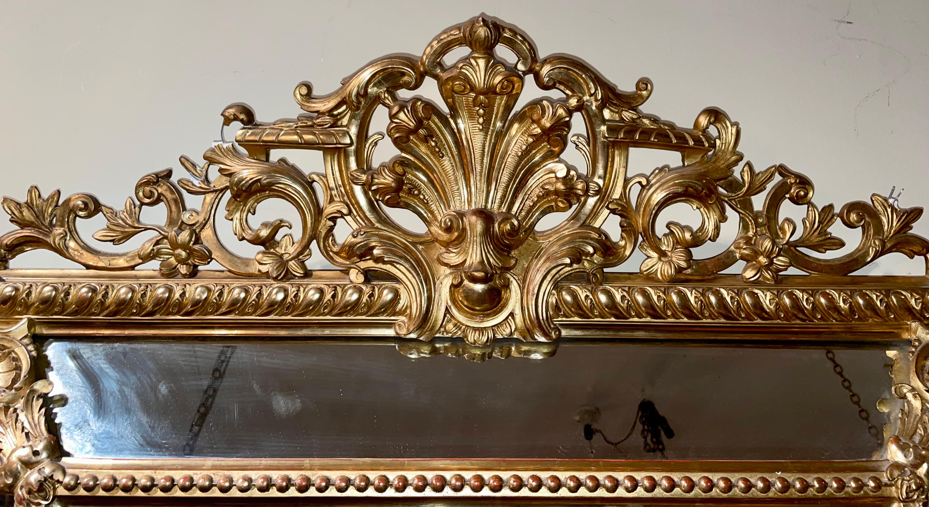Miroir antique français Louis XVI à panneaux dorés à la feuille, vers 1890. 