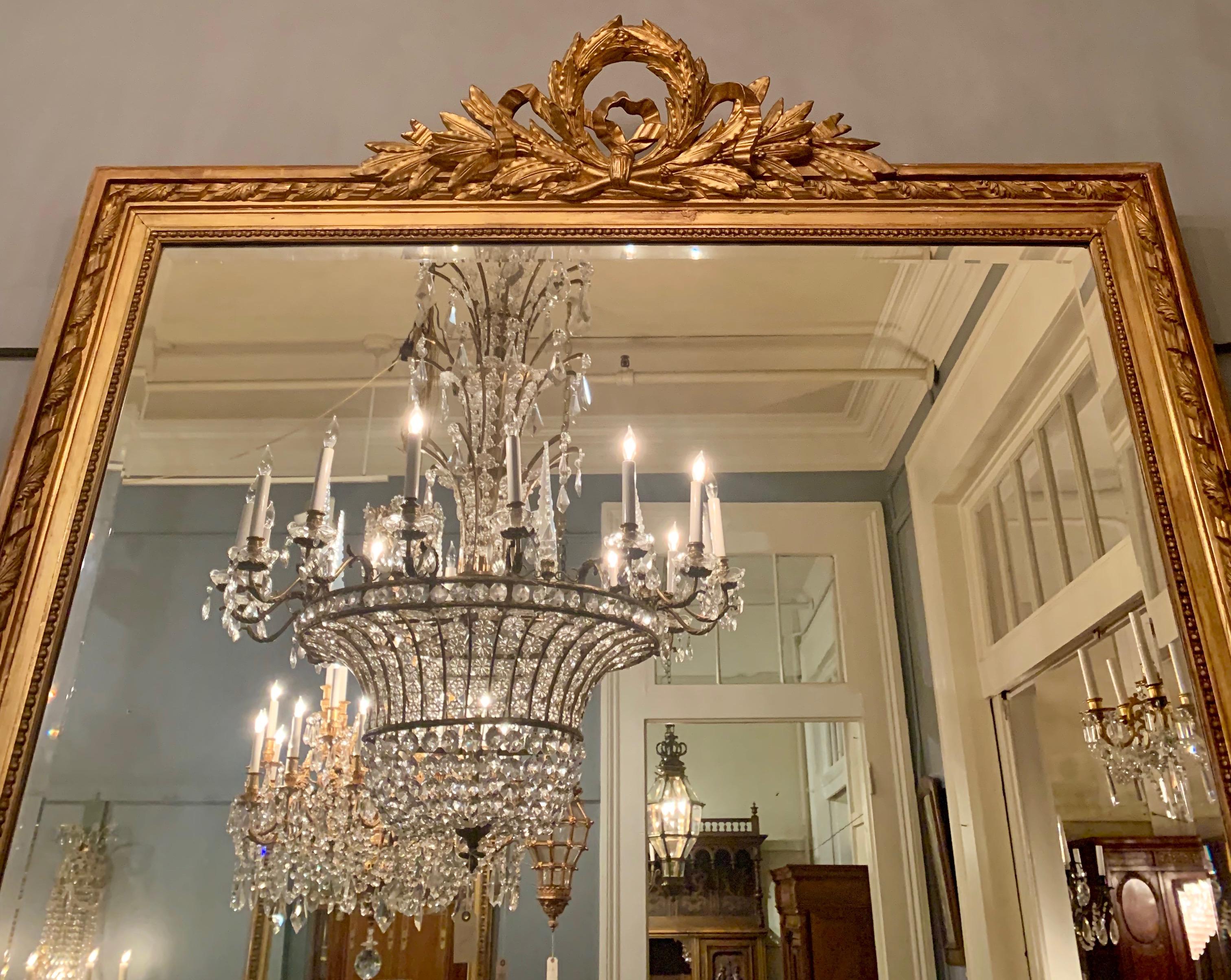 Antique French Louis XVI gold mirror, late 19th century.

 