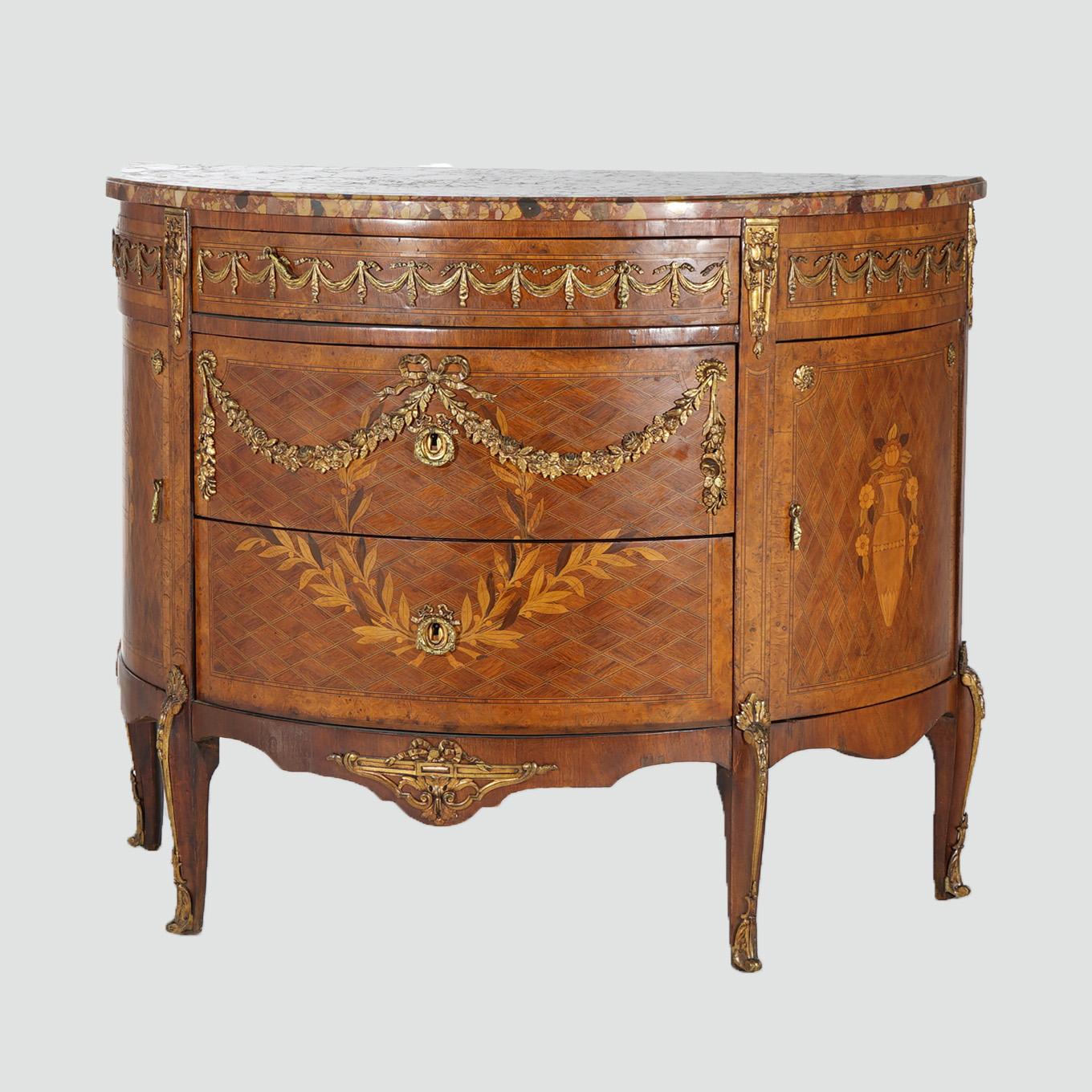 ***Ask About Lower In-House Shipping Rates - Reliable Service, Competitive Rates & Fully Insured***

An antique French Louis XVI E Blanchet console offers specimen marble top over kingwood base in demilune form and having satinwood marquetry wreath,